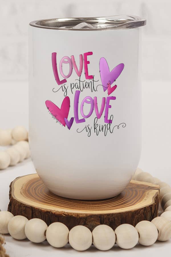 A stylish 12 oz stainless steel wine tumbler with the printed message 'Love is Patient, Love is Kind' on both sides, complete with a lid and straw.
