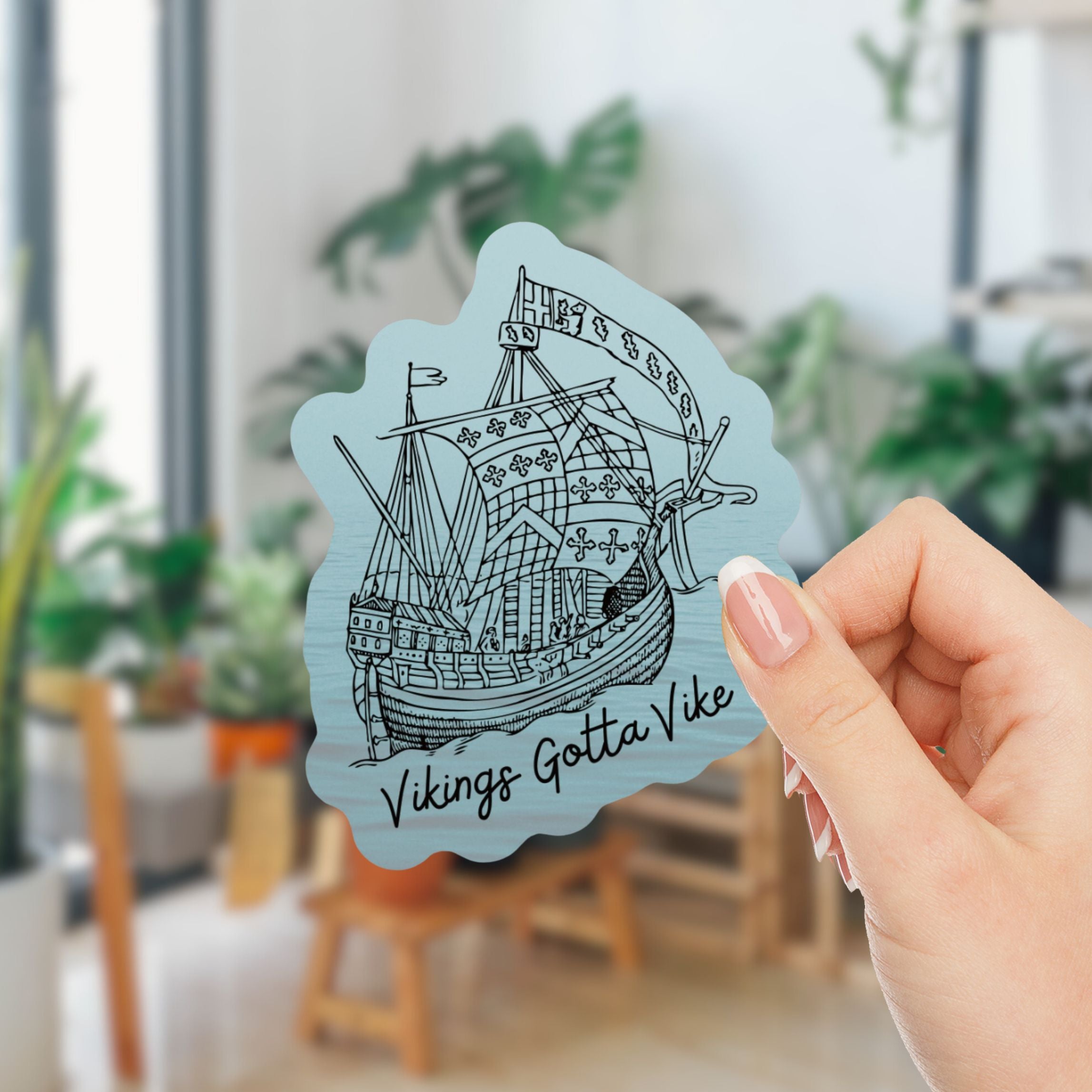 Vikings Gotta Vike Sticker featuring bold text and a glossy finish, perfect for showcasing Nordic pride.