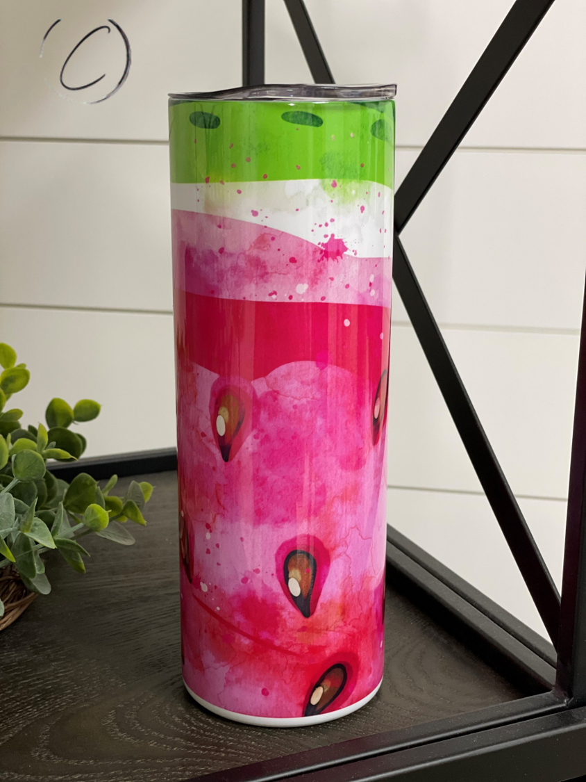 A stylish 20oz skinny tumbler featuring a vibrant watermelon design, perfect for drinks on the go.
