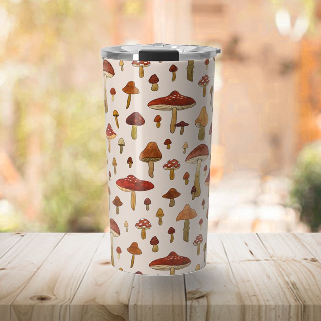 A stylish Watercolor Mushroom Travel Mug made of stainless steel with a vibrant mushroom design, perfect for hot and cold beverages.