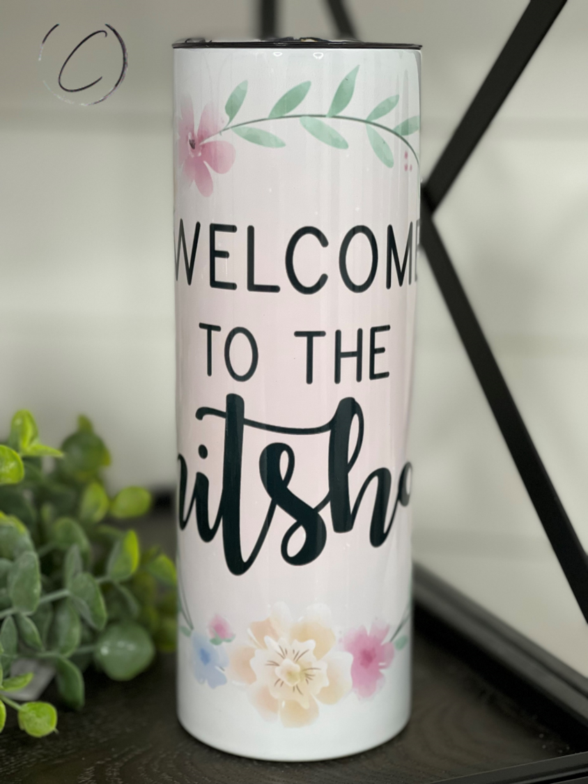 Welcome To The Shitshow 20oz Skinny Tumbler featuring a vibrant design, reusable straw, and sleek skinny shape for easy handling.