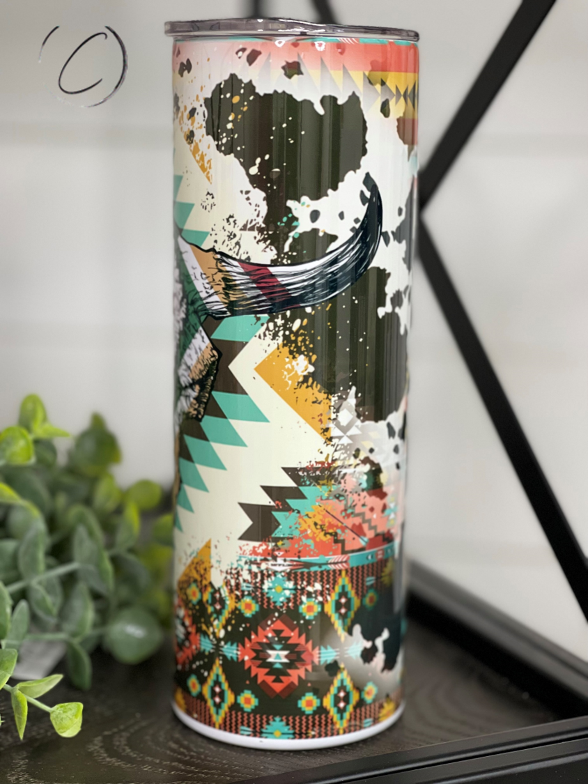 Western Aztec Bull Skull 20oz Skinny Tumbler with vibrant design and reusable straw.