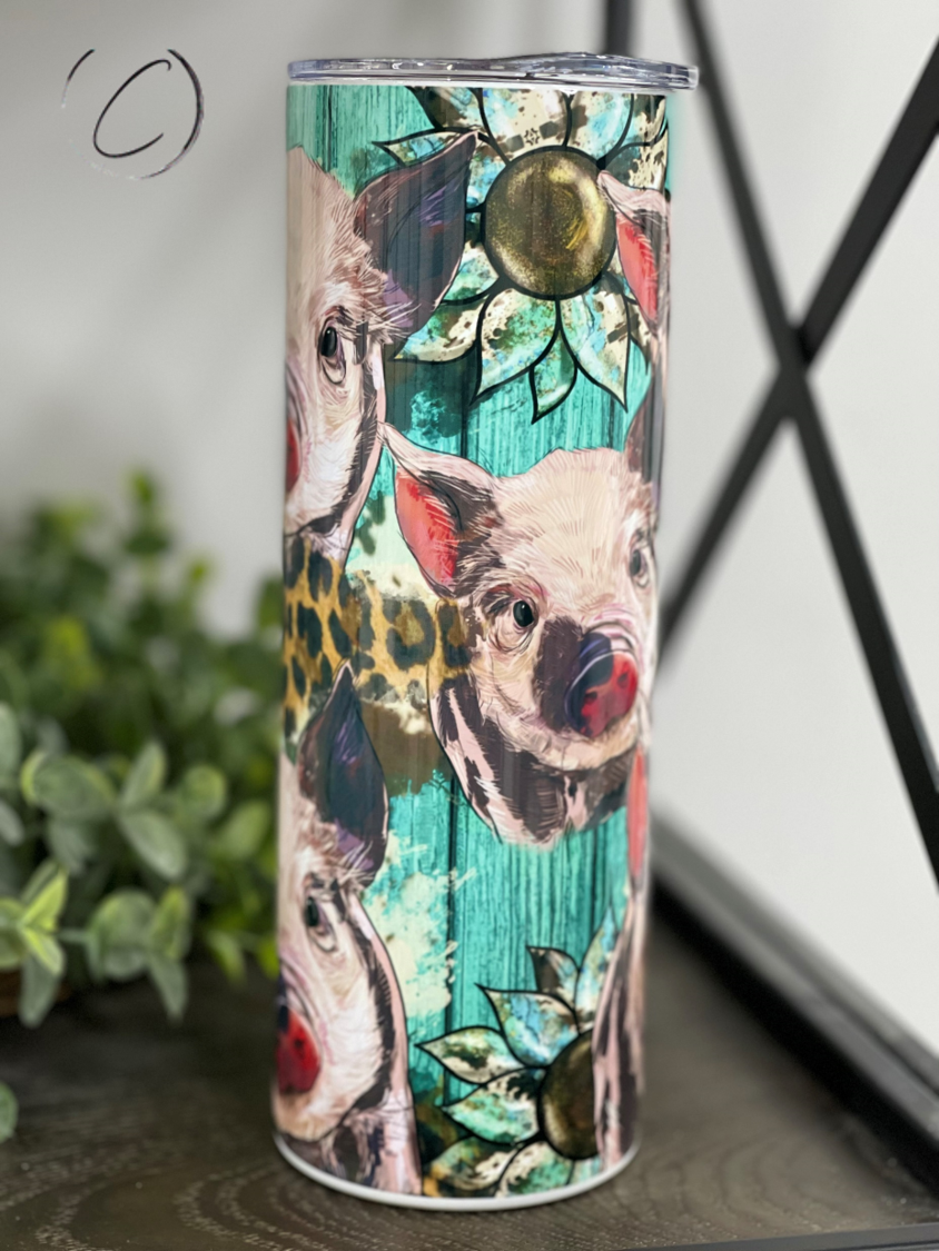Western Sunflower Piglets 20oz Skinny Tumbler with vibrant sunflower design and reusable straw.