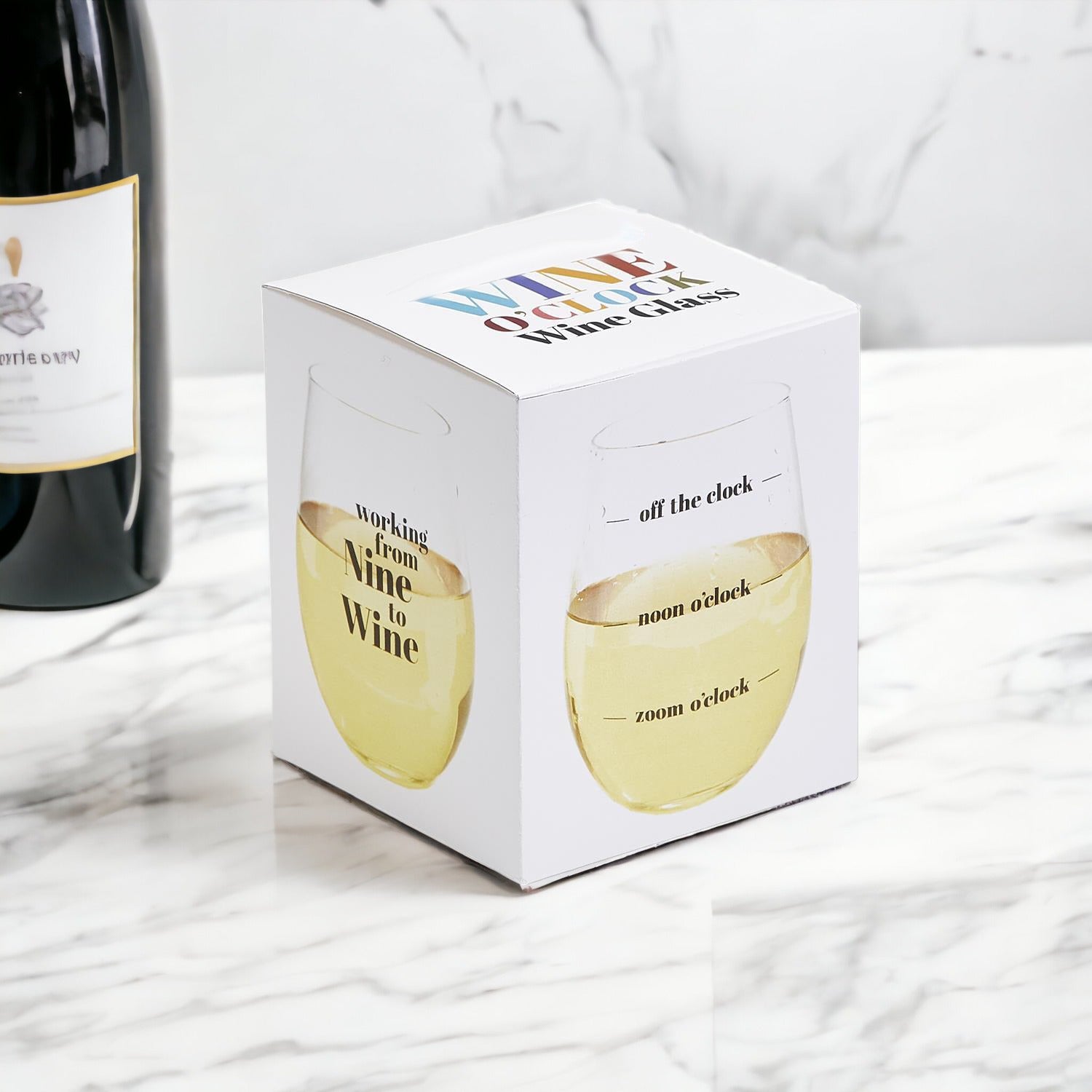 A set of elegant stemless wine and whiskey glasses with witty quotes, beautifully packaged in a decorative gift box.