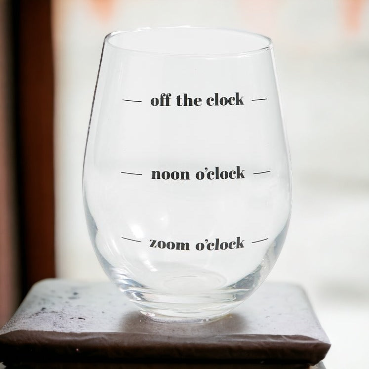 A set of elegant stemless wine and whiskey glasses with witty quotes, beautifully packaged in a decorative gift box.