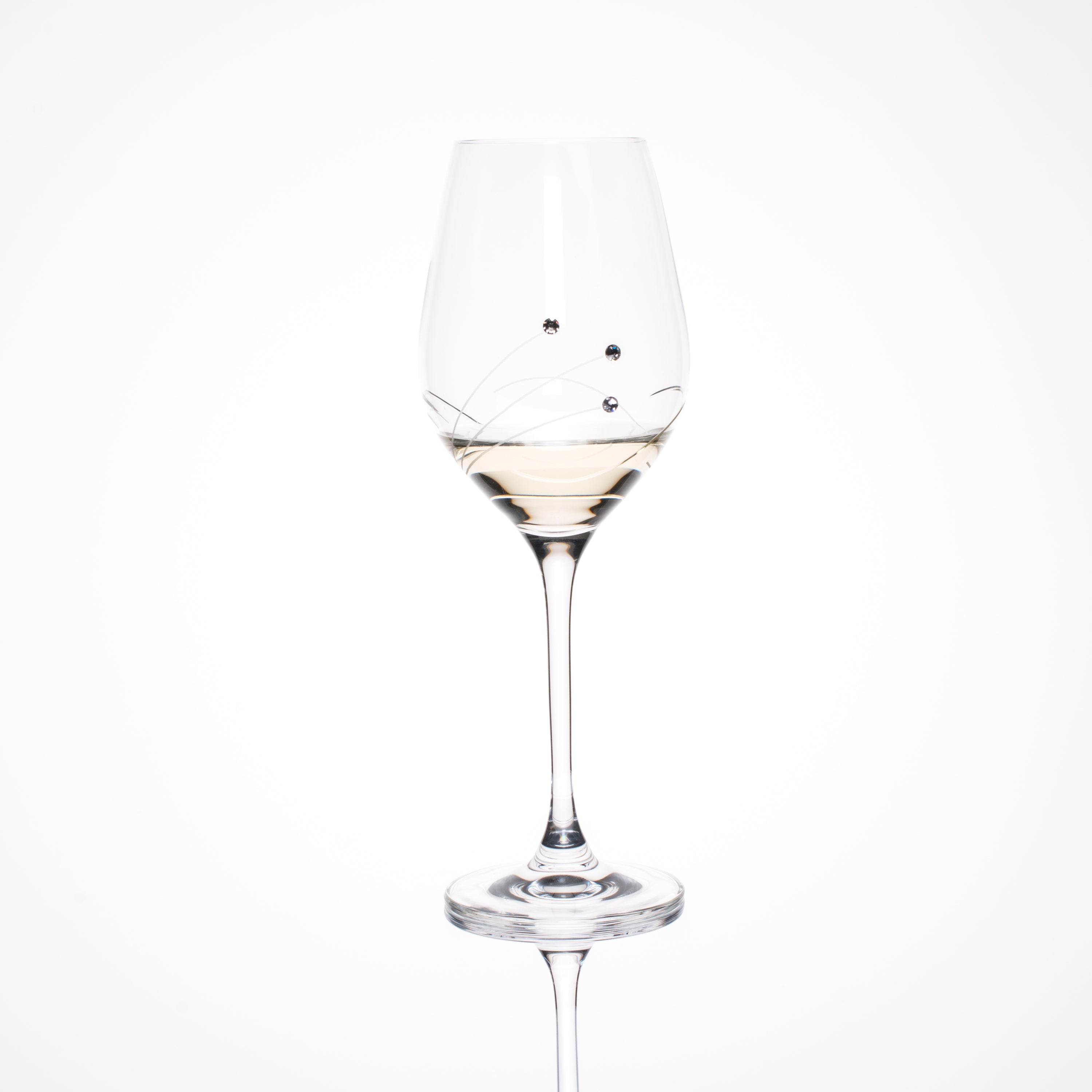 Set of 2 elegant Wine Waves White Wine Glasses with Swarovski crystals in a gift box, showcasing intricate hand-cut designs.