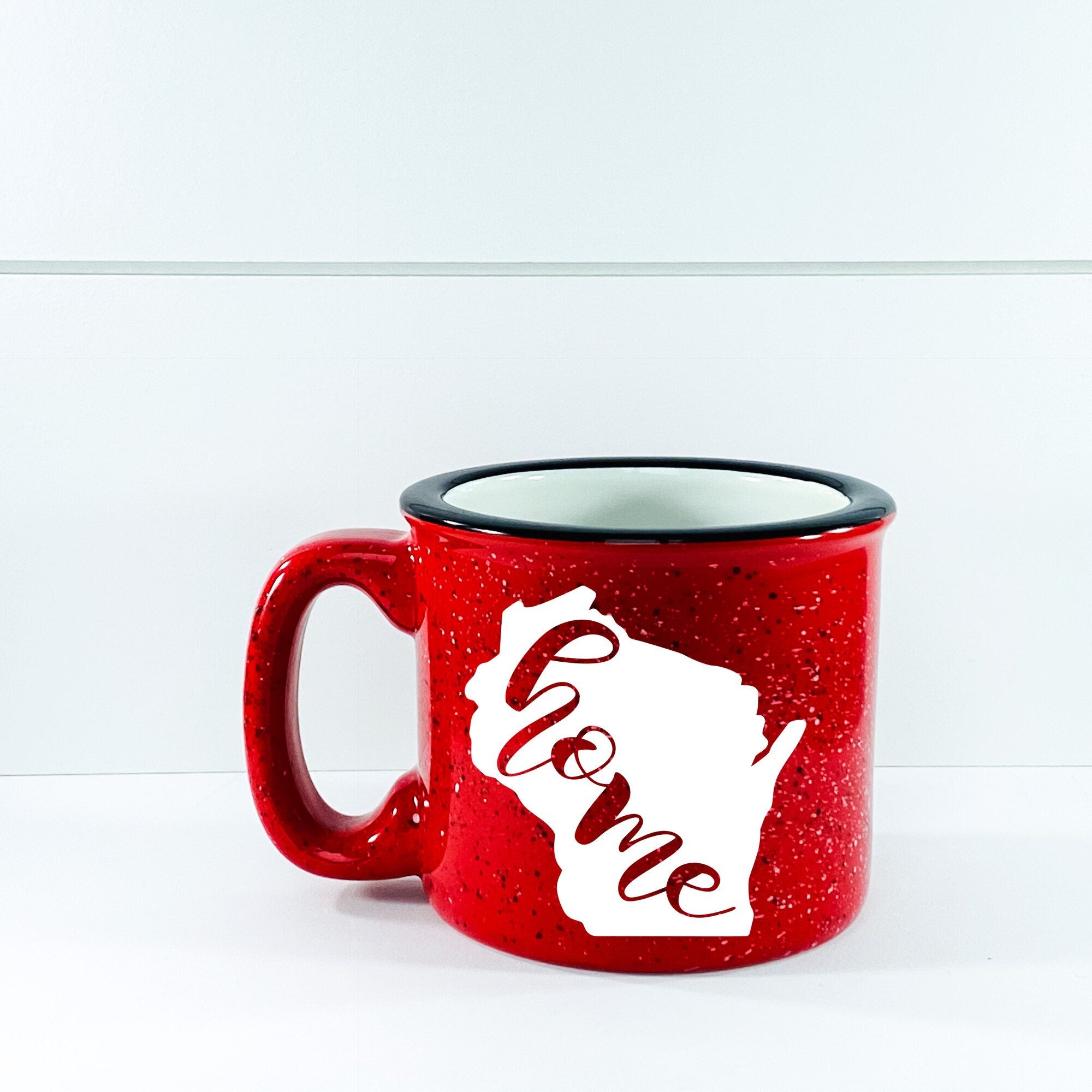 Wisconsin Home State Campfire Mug with unique design, perfect for cozy beverages.