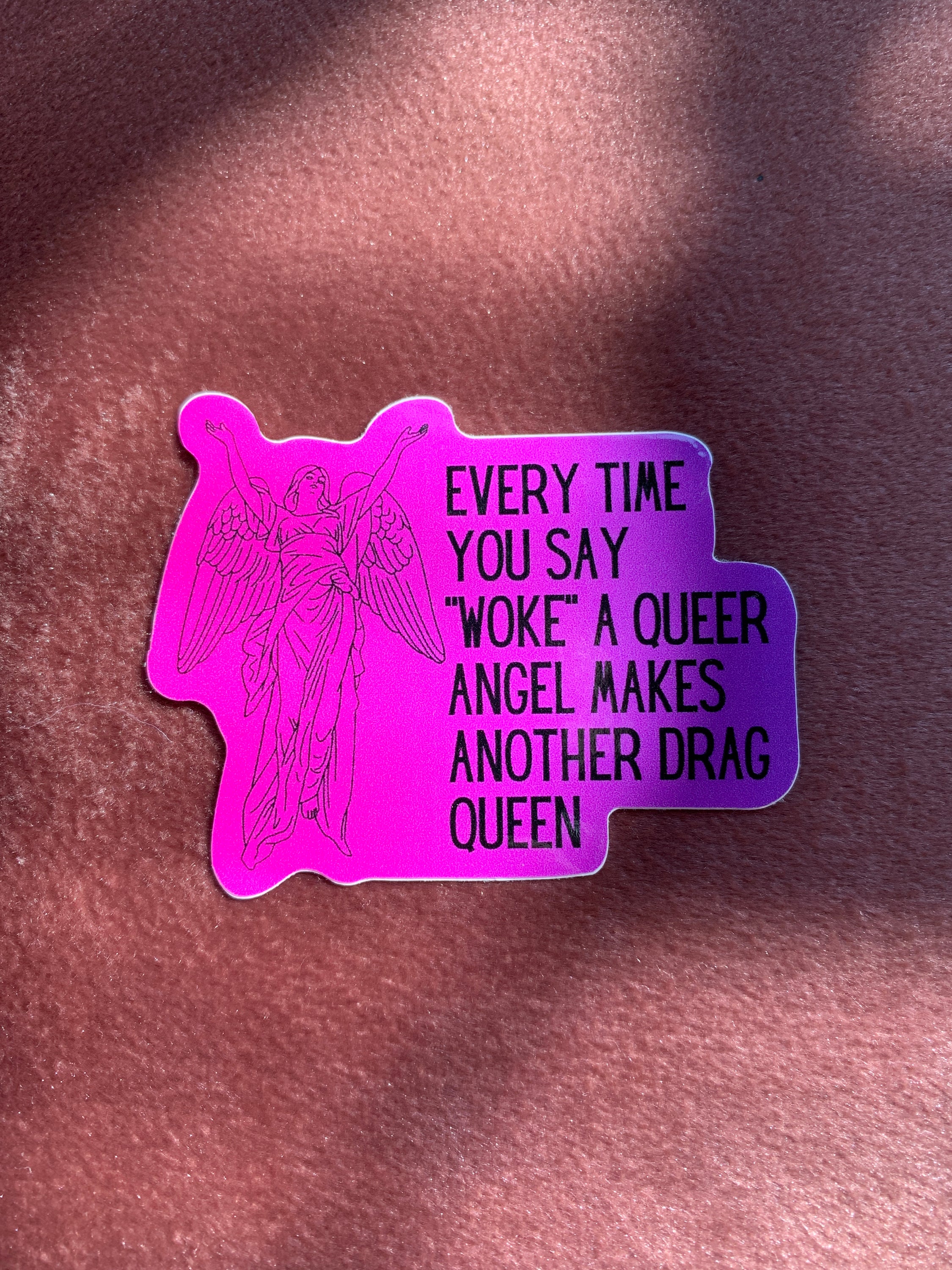 Woke Queer Angel Drag Queen Sticker featuring vibrant colors and a playful message about LGBTQ+ pride.