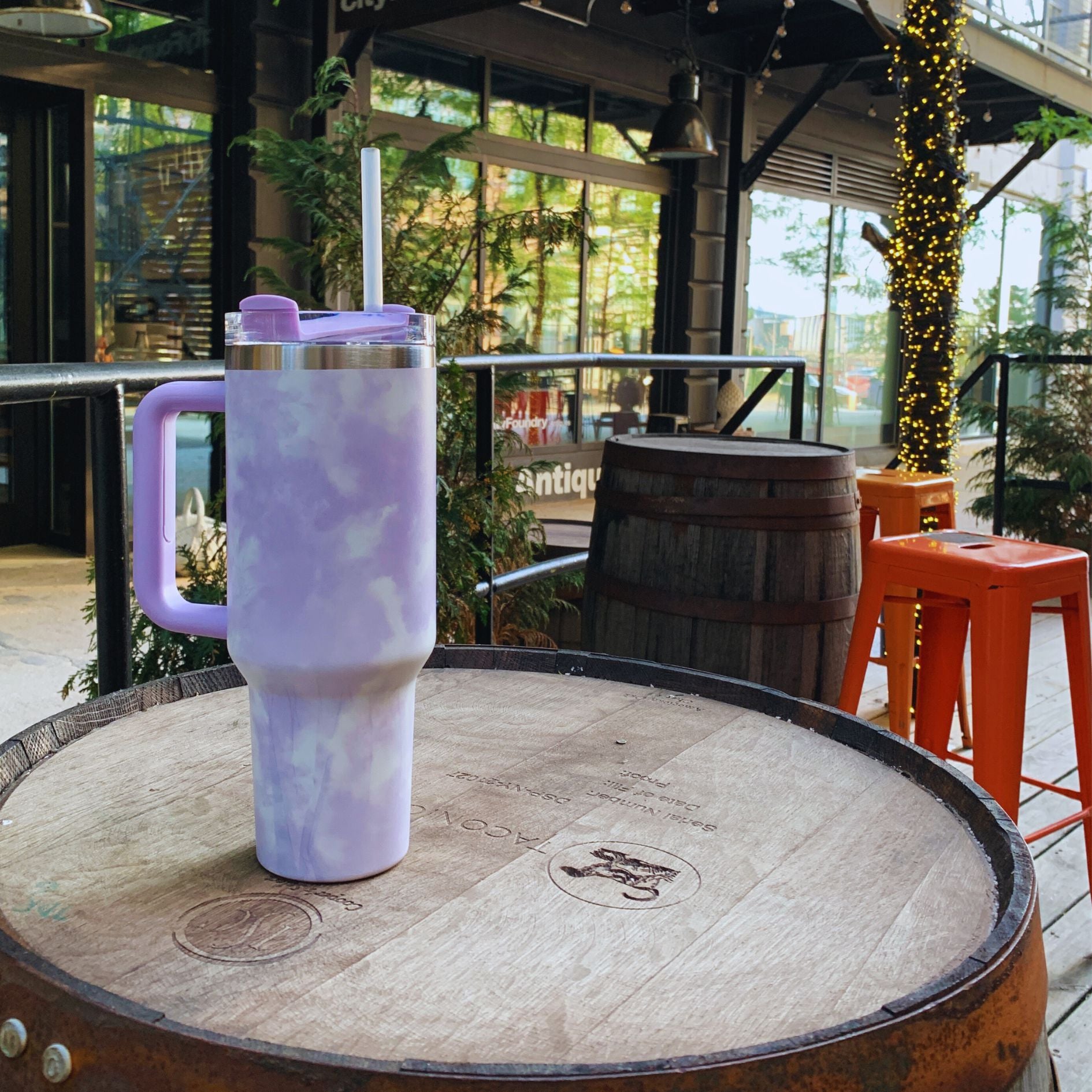 GetBullish Sticker Tumbler 40 oz in stainless steel with a whimsical design, perfect for hot and cold drinks.