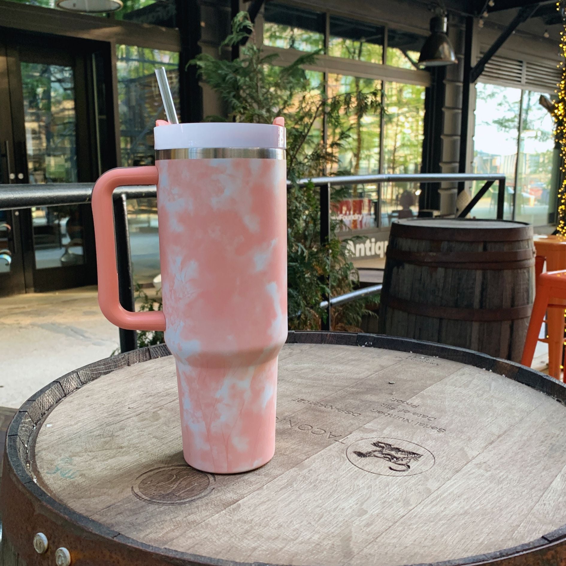 GetBullish Sticker Tumbler 40 oz in stainless steel with a whimsical design, perfect for hot and cold drinks.