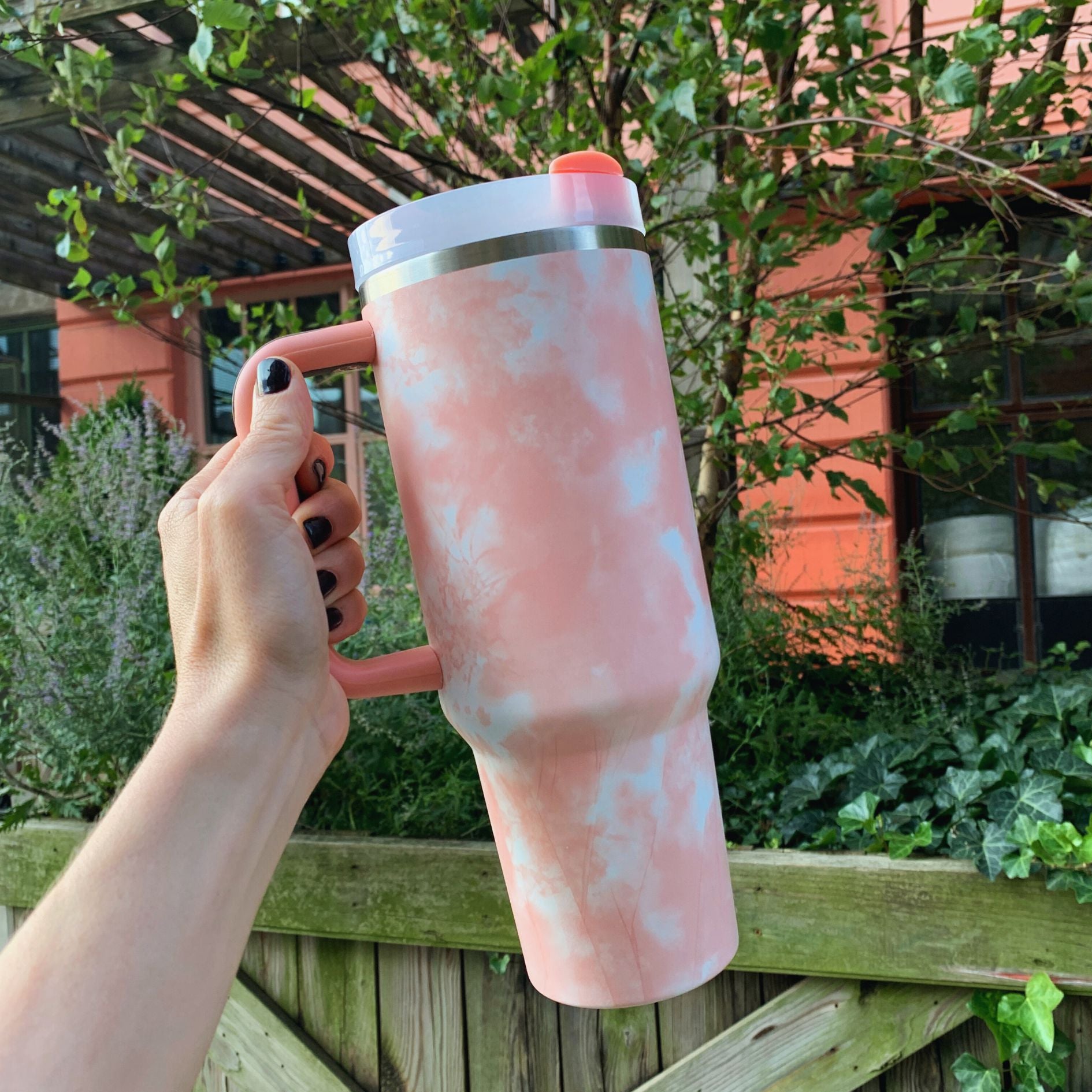 GetBullish Sticker Tumbler 40 oz in stainless steel with a whimsical design, perfect for hot and cold drinks.