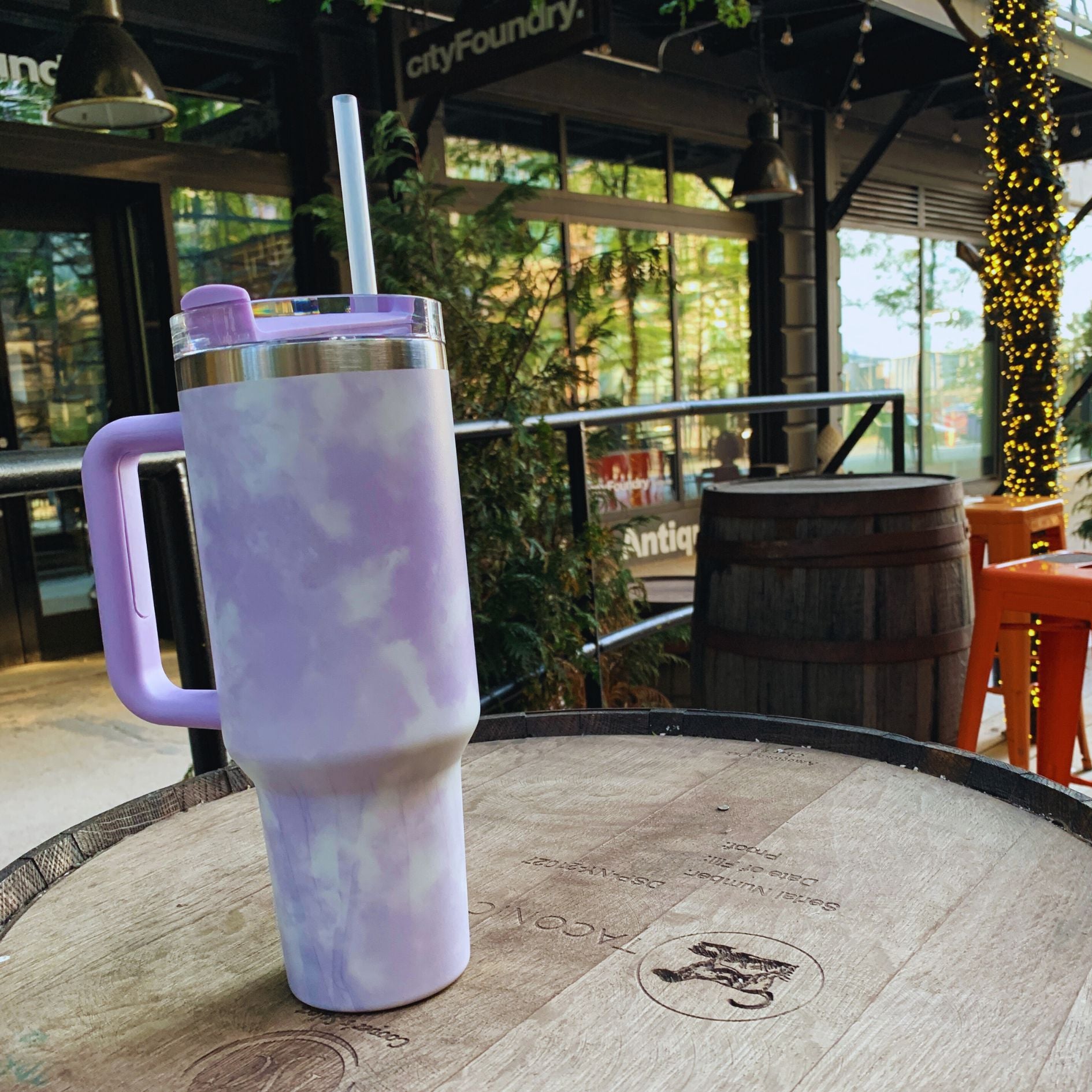 GetBullish Sticker Tumbler 40 oz in stainless steel with a whimsical design, perfect for hot and cold drinks.