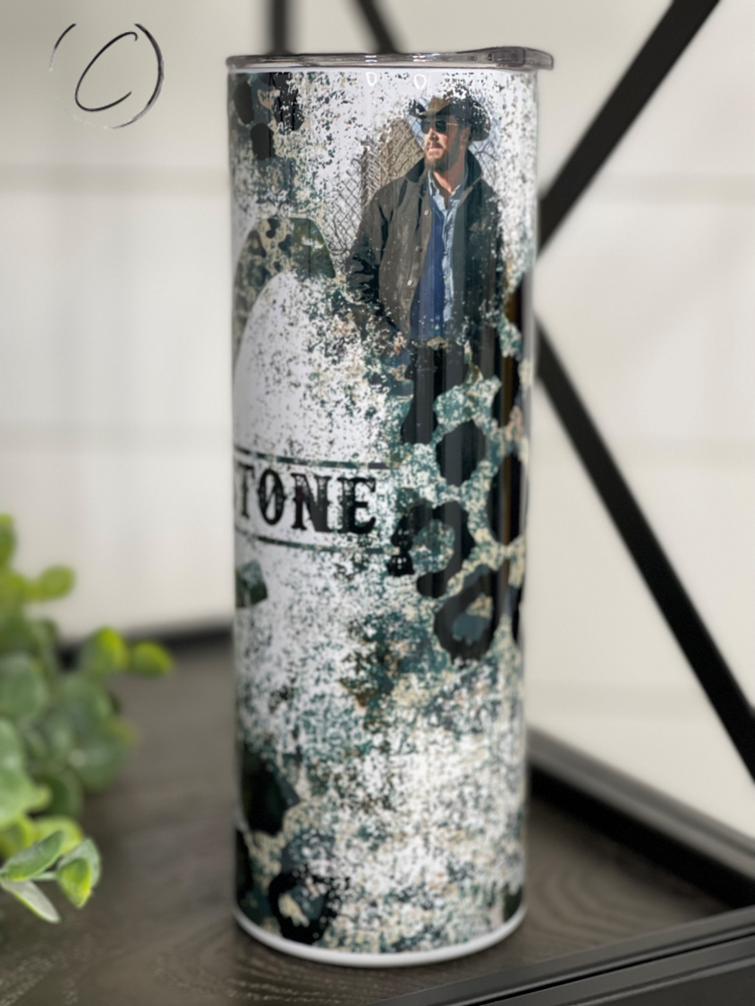 Yellowstone Rustic Leopard 20oz Skinny Tumbler with a unique leopard print design, featuring a reusable straw.
