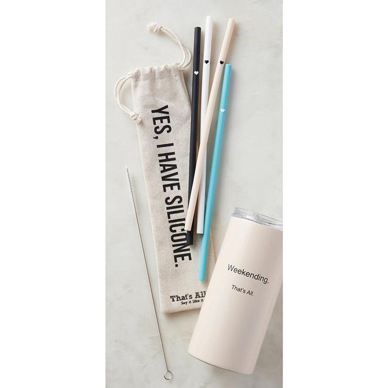 Colorful silicone straw set with a cleaning brush and drawstring bag, featuring the phrase 'Yes, I have silicone.'