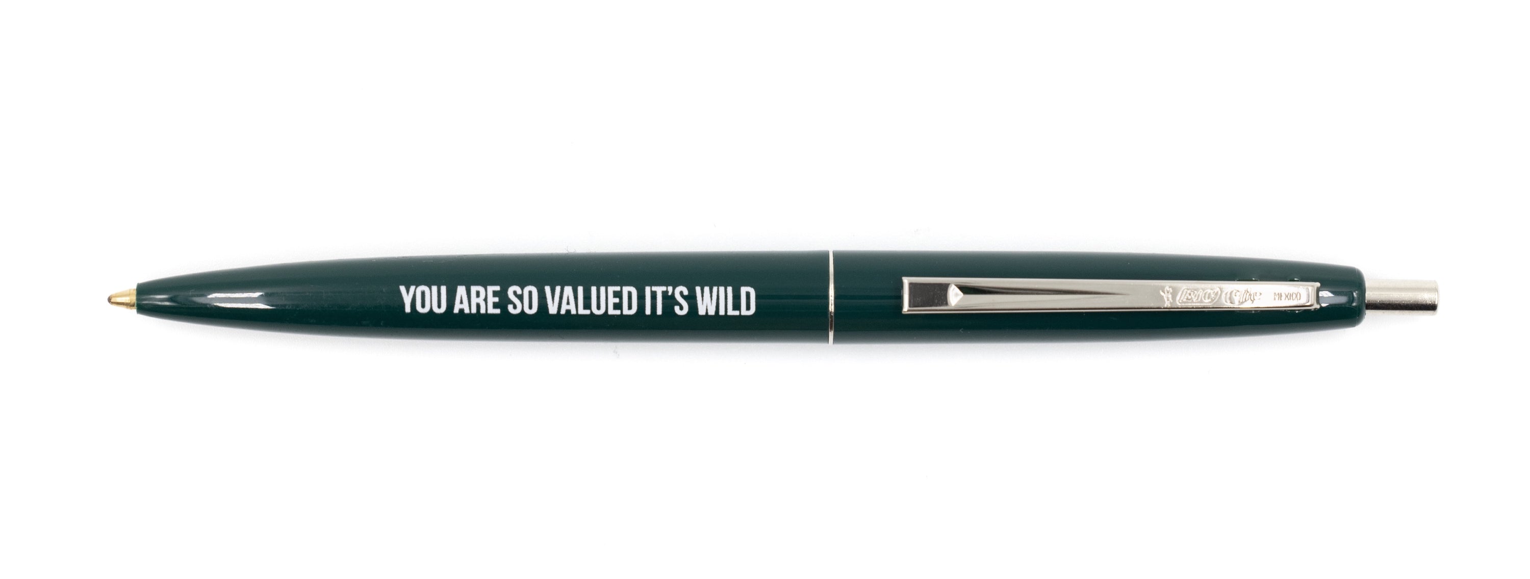 You Are So Valued It's Wild refillable pen in forest green and silver with white lettering, showcasing its elegant design.