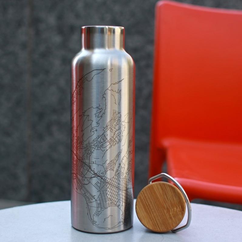 Custom engraved stainless steel bottle featuring a detailed map of Zion National Park, Utah, with a bamboo top, ideal for outdoor adventures.