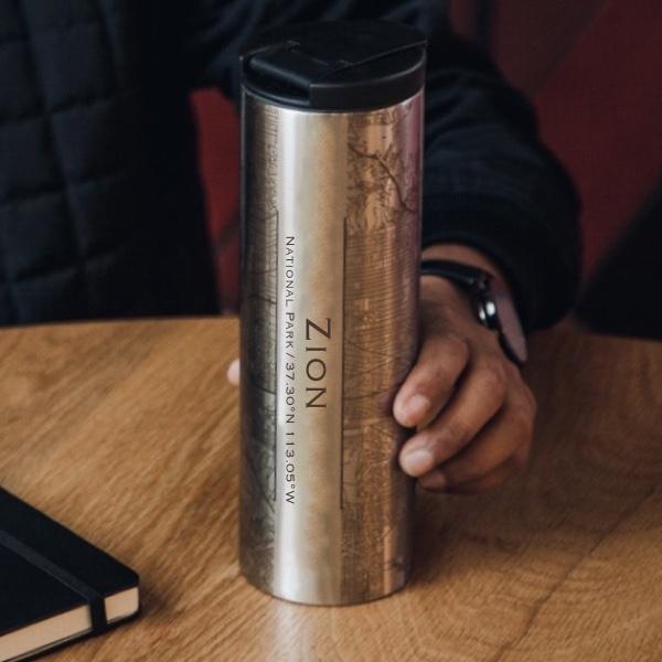 Custom engraved stainless steel tumbler featuring a detailed map of Zion National Park, Utah, with coordinates.