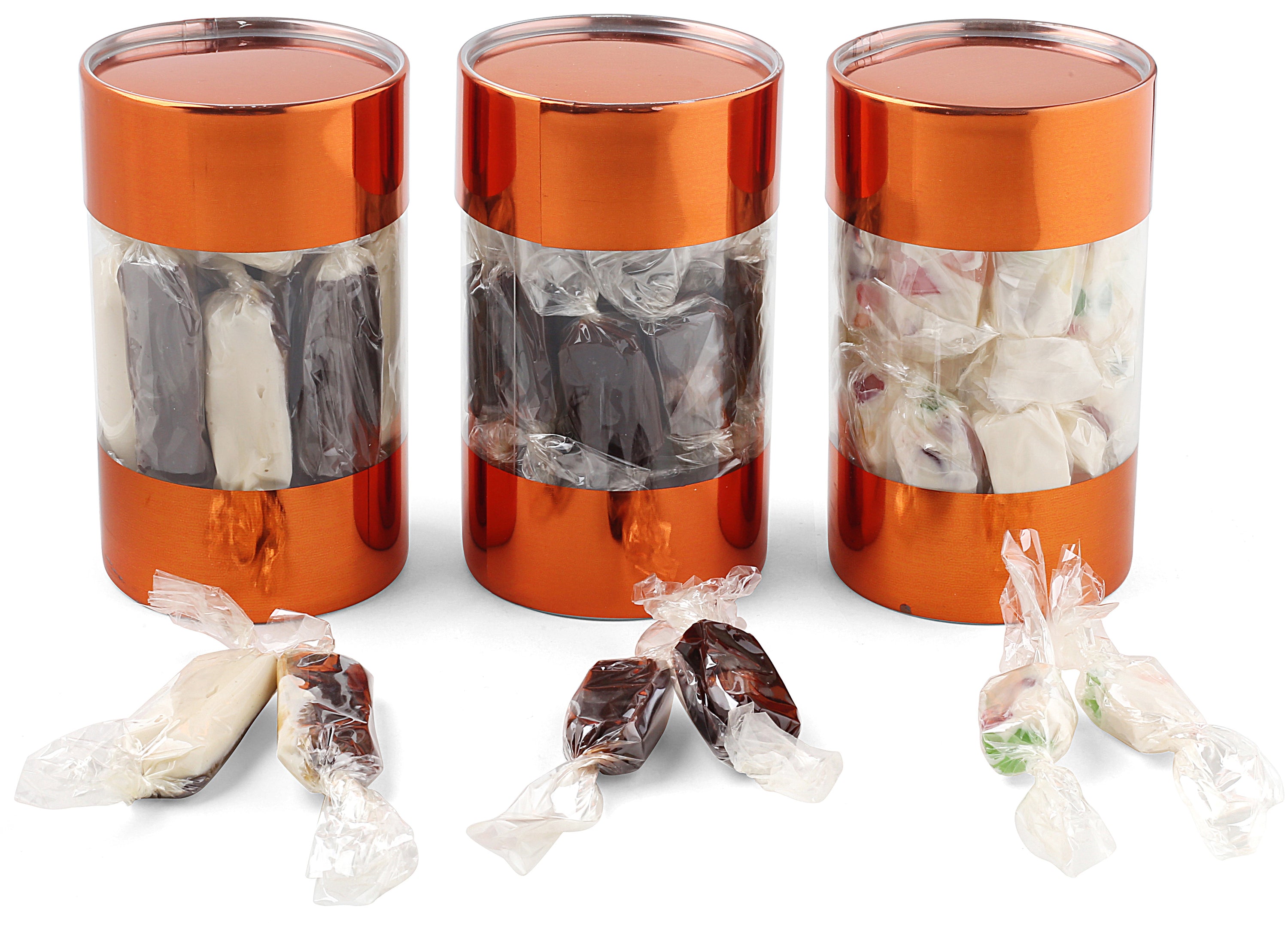 A festive 3-Pack Gift Set featuring individually wrapped holiday candies including Juju Candy, Chocolate Butter Softies, and Chocolate Almond Kisses.