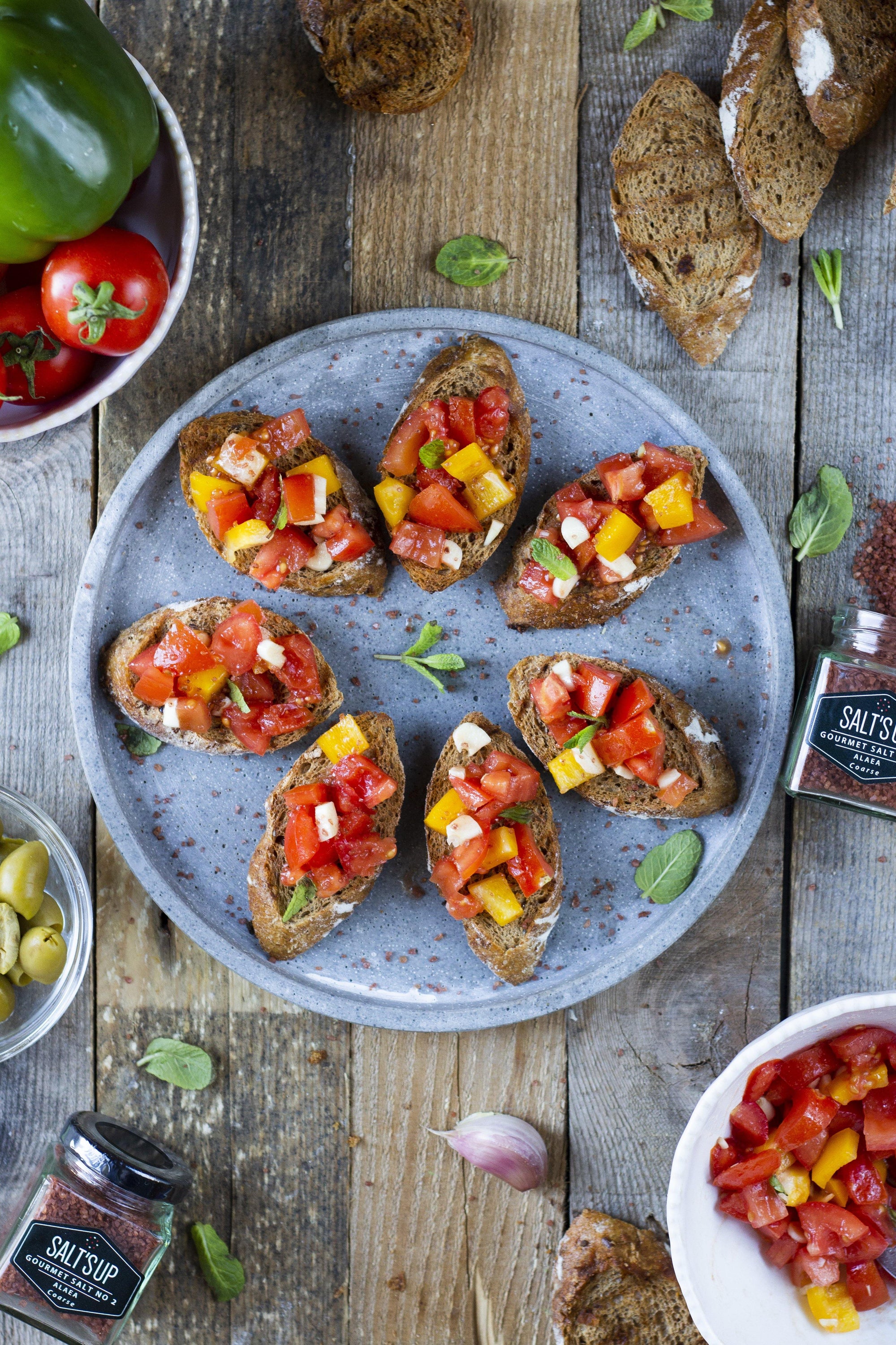 ALAEA coarse salt ecopack featuring traditional Hawaiian sea salt with a reddish hue from volcanic clay, packaged in eco-friendly materials.