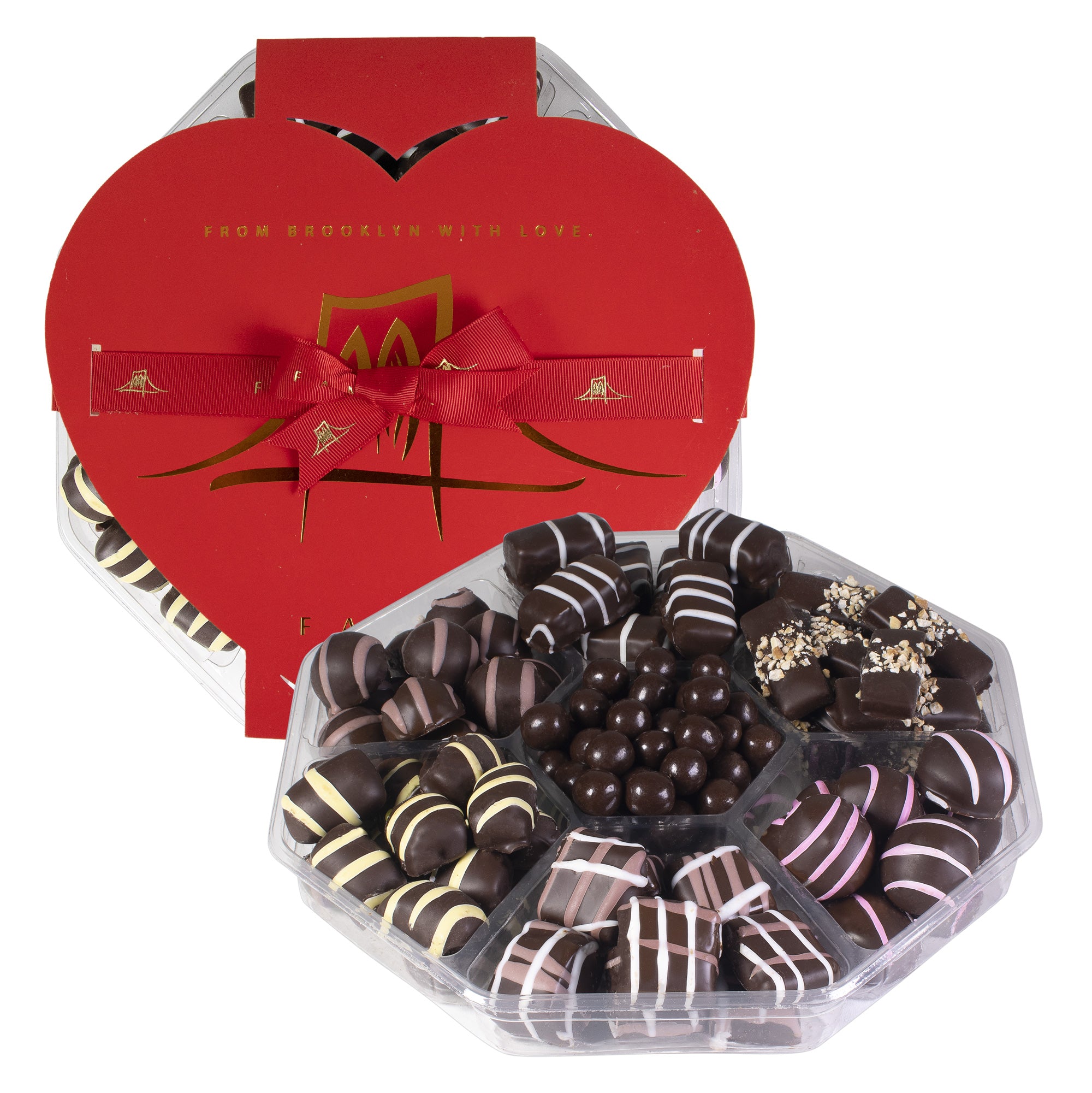 Artisan crafted chocolate assortment in elegant packaging, featuring various flavors like super berry, pineapple, and coffee cream.