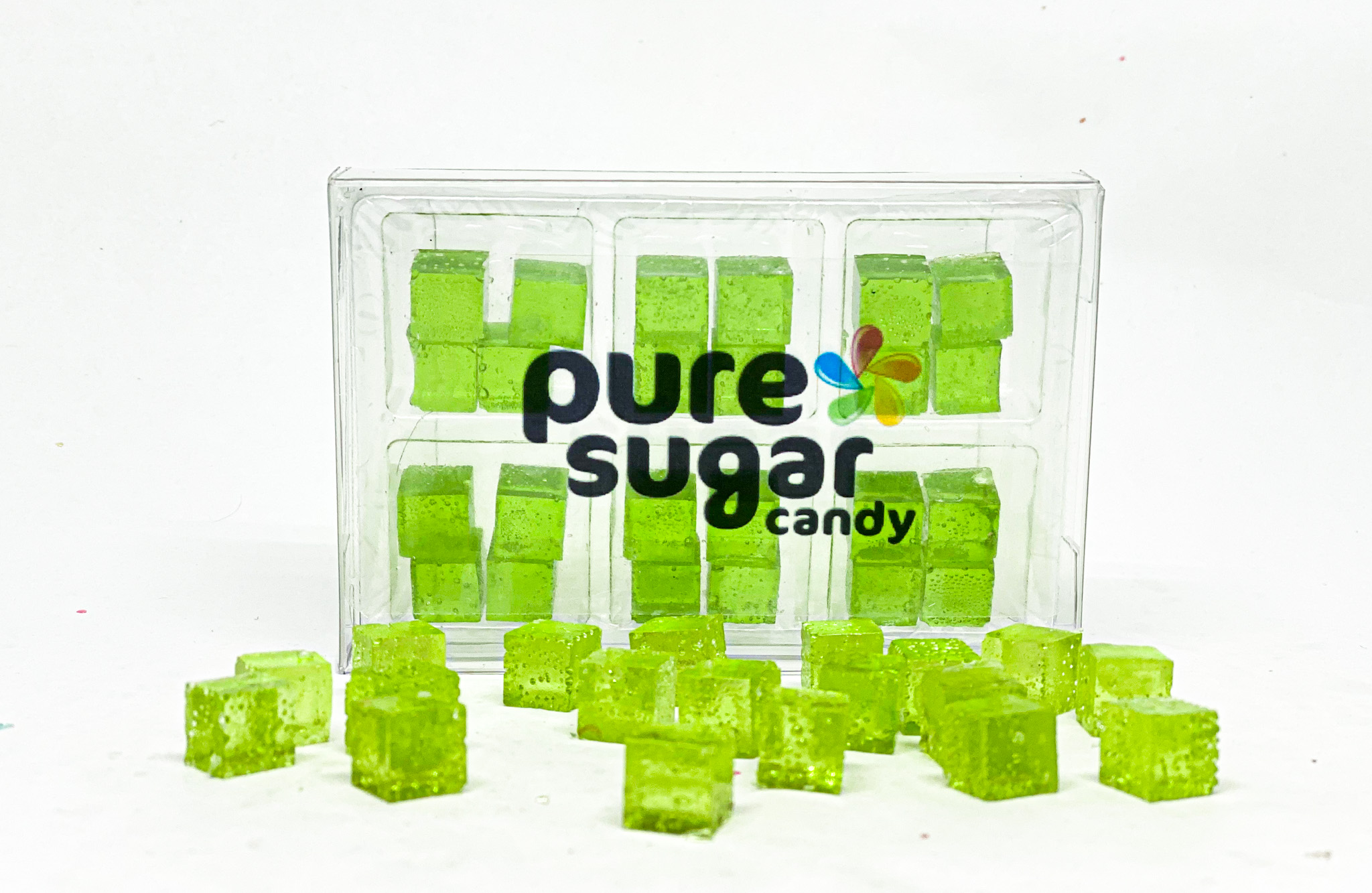 A vibrant tray of Candy Cubes in honey dew melon flavor, showcasing colorful cubes ready for snacking.