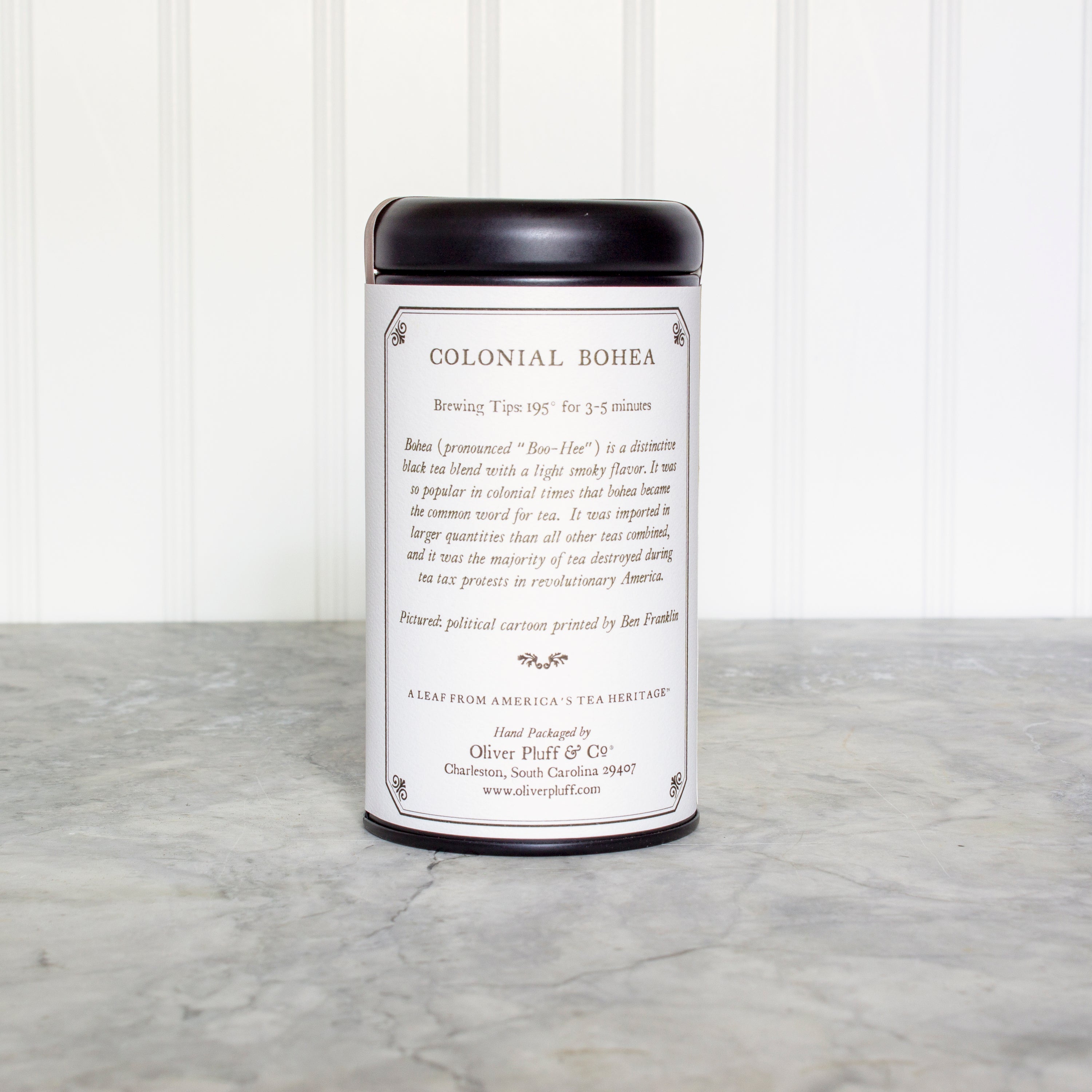 Colonial Bohea Teabags Tea Tin featuring 20 biodegradable teabags, elegantly packaged in a matte black tin.