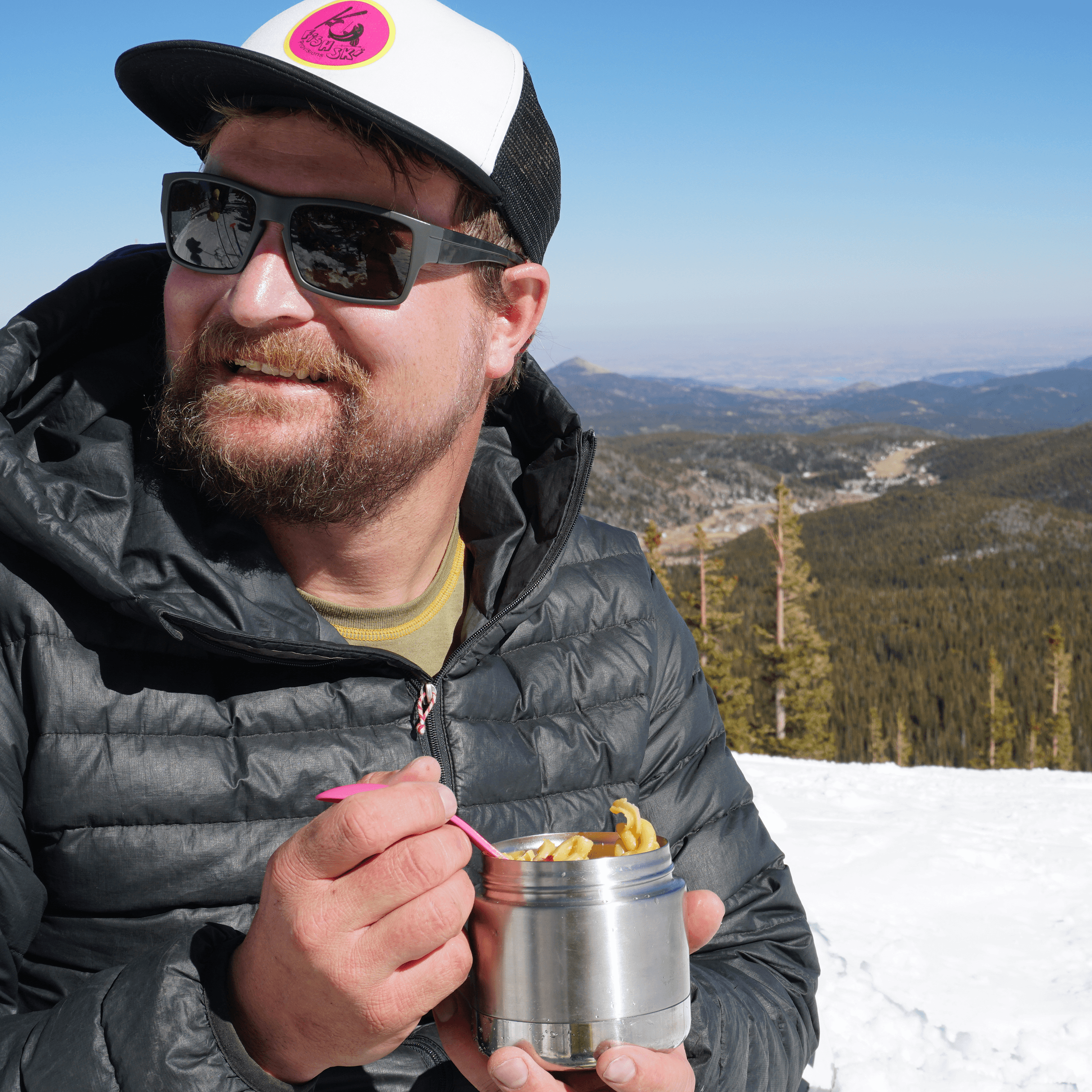 A delicious bowl of Combo Hatch Green Chile and Red Chile Cheddar Mac and Cheese, featuring vibrant colors and a creamy texture.