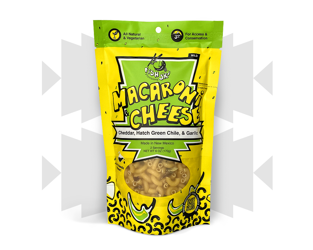 A delicious bowl of Combo Hatch Green Chile and Red Chile Cheddar Mac and Cheese, featuring vibrant colors and a creamy texture.