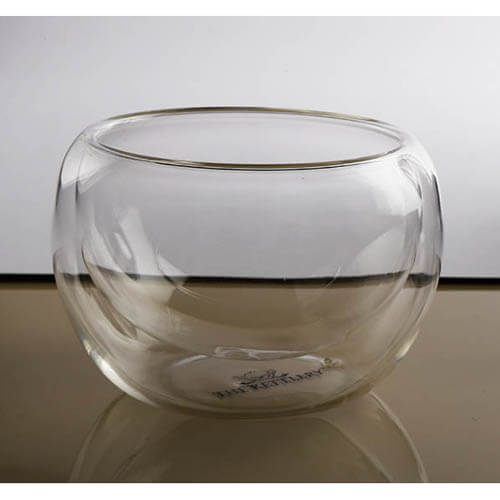 Elegant double walled kava tea cups showcasing a floating liquid illusion, perfect for tea and desserts.