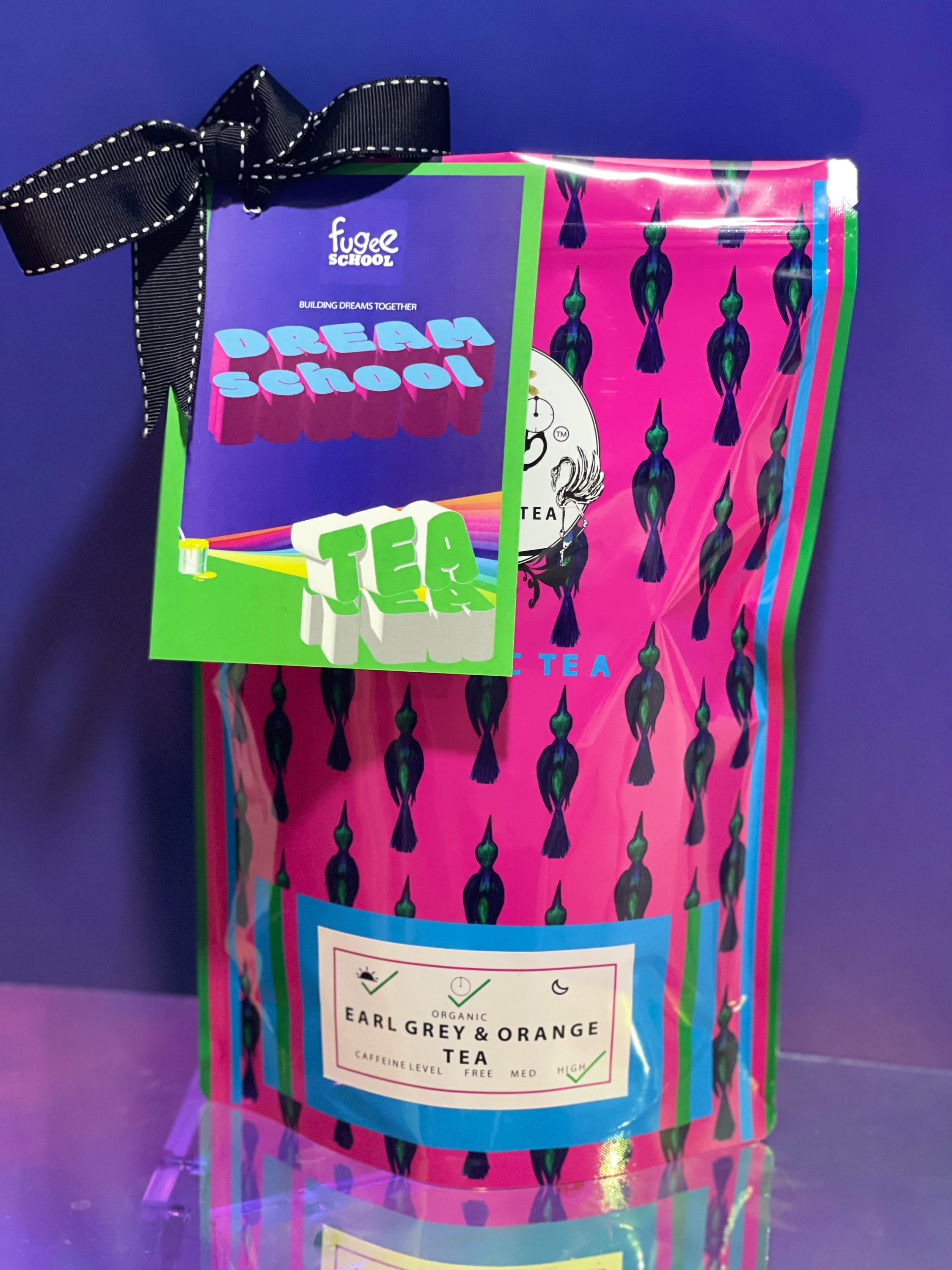 A box of Earl Grey and Orange Tea featuring 200 teabags, showcasing vibrant packaging and a blend of black tea with orange flavor.