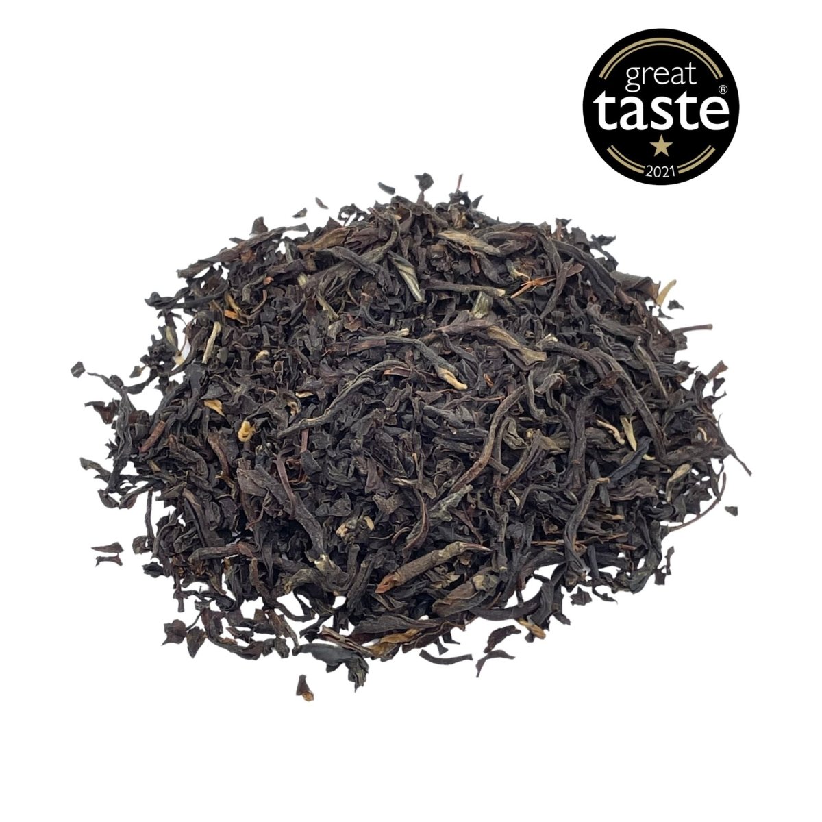 A close-up of English Breakfast Loose Leaf tea, showcasing the rich black tea leaves blended from various regions.