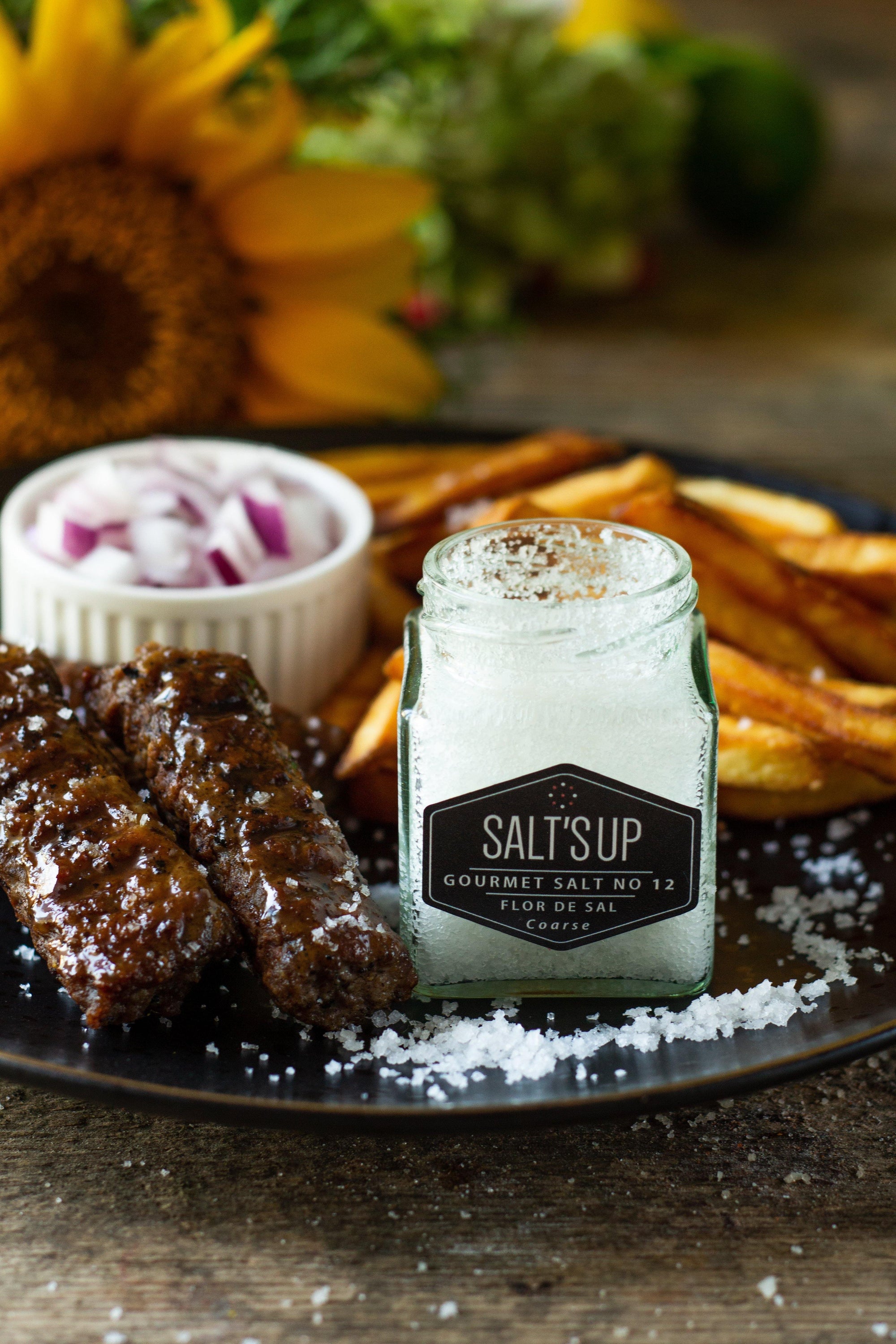 FLOR DE SAL coarse ecopack featuring delicate, flaky salt crystals harvested from Algarve, Portugal.