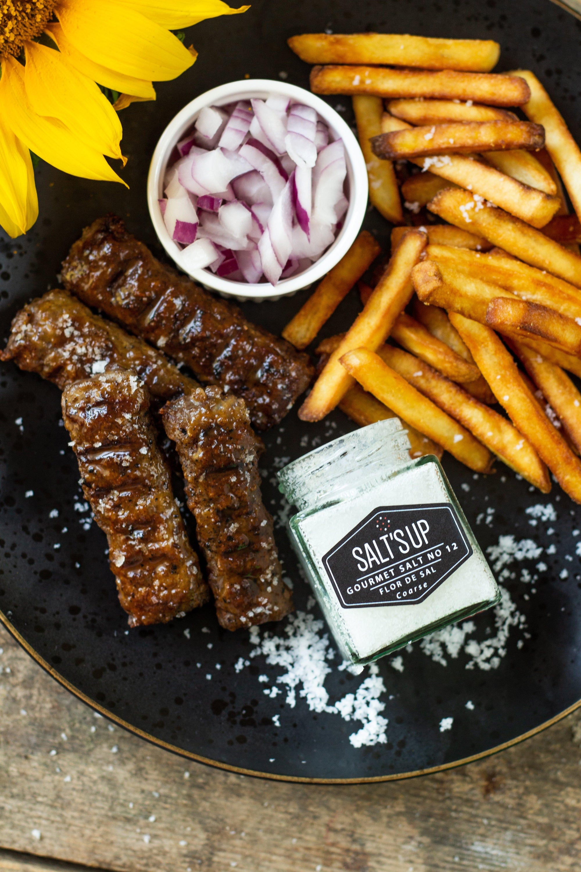 FLOR DE SAL coarse ecopack featuring delicate, flaky salt crystals harvested from Algarve, Portugal.