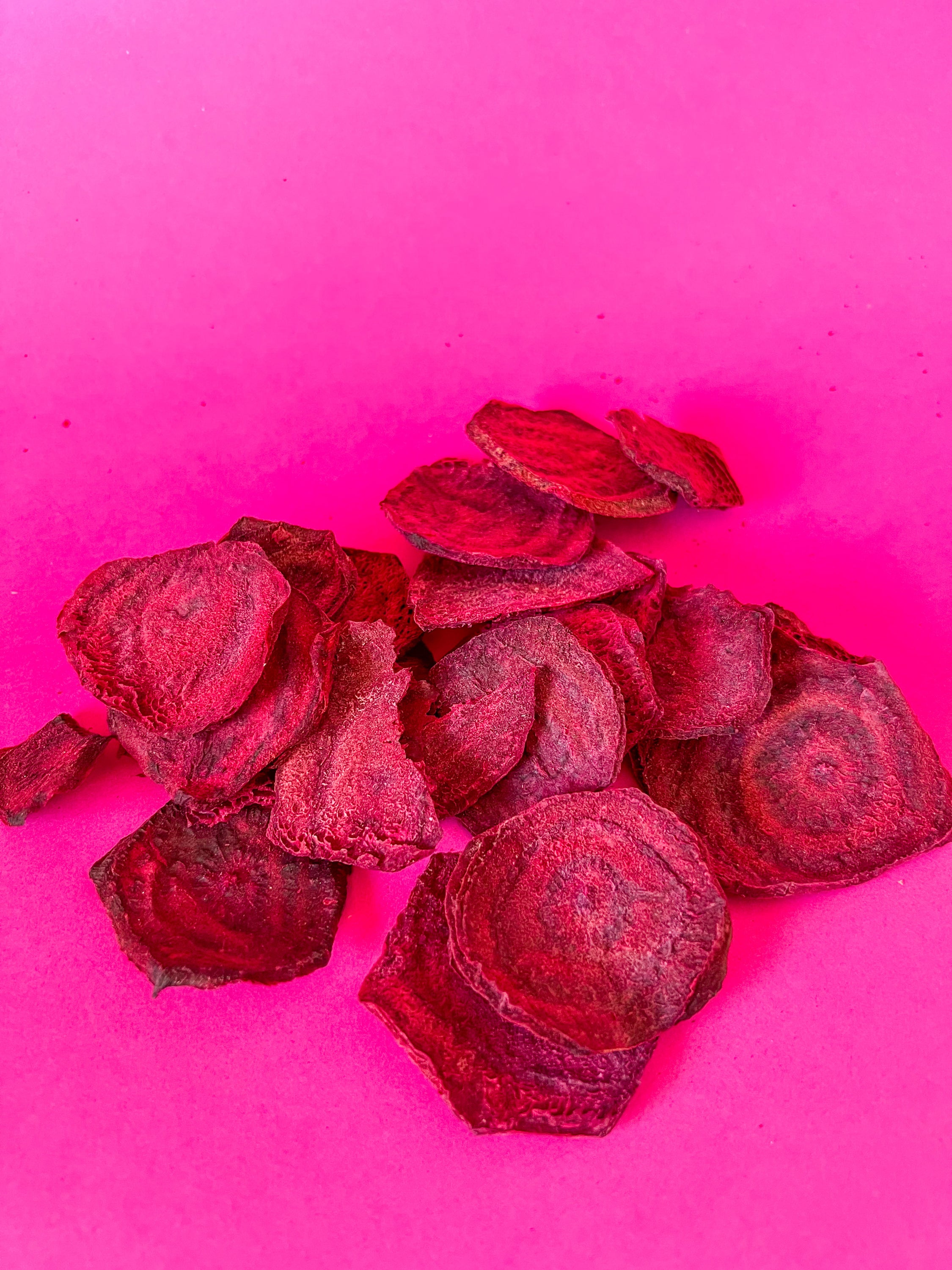 NutriBoom Freeze-dried Beetroots in a clear package, showcasing vibrant red color and natural texture.