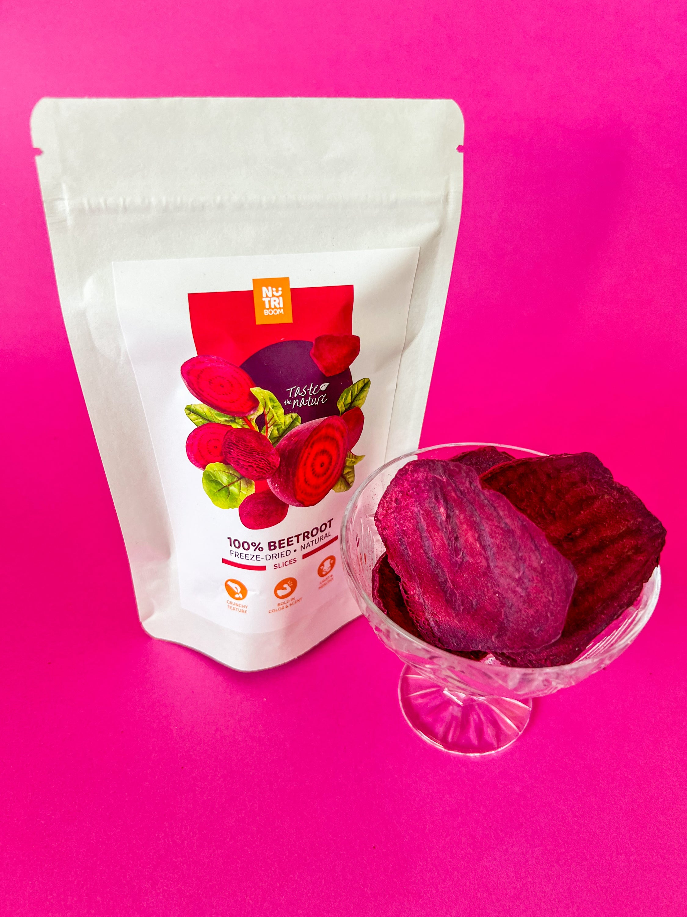 NutriBoom Freeze-dried Beetroots in a clear package, showcasing vibrant red color and natural texture.