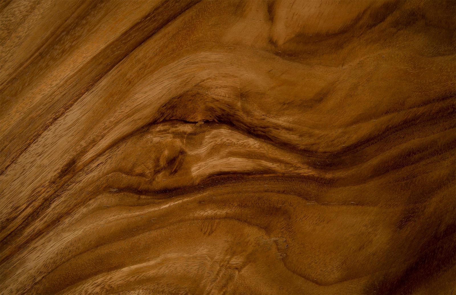 Geometry Large Natural Side Table made of Chamcha wood with a sleek black and natural finish, showcasing unique wood grain patterns.
