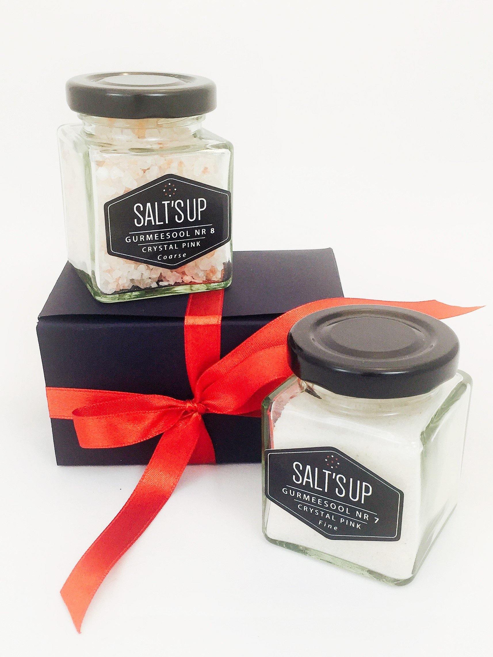 Gift box containing two jars of gourmet Himalayan Crystal Pink salt, one fine and one coarse, showcasing their beautiful pink color.