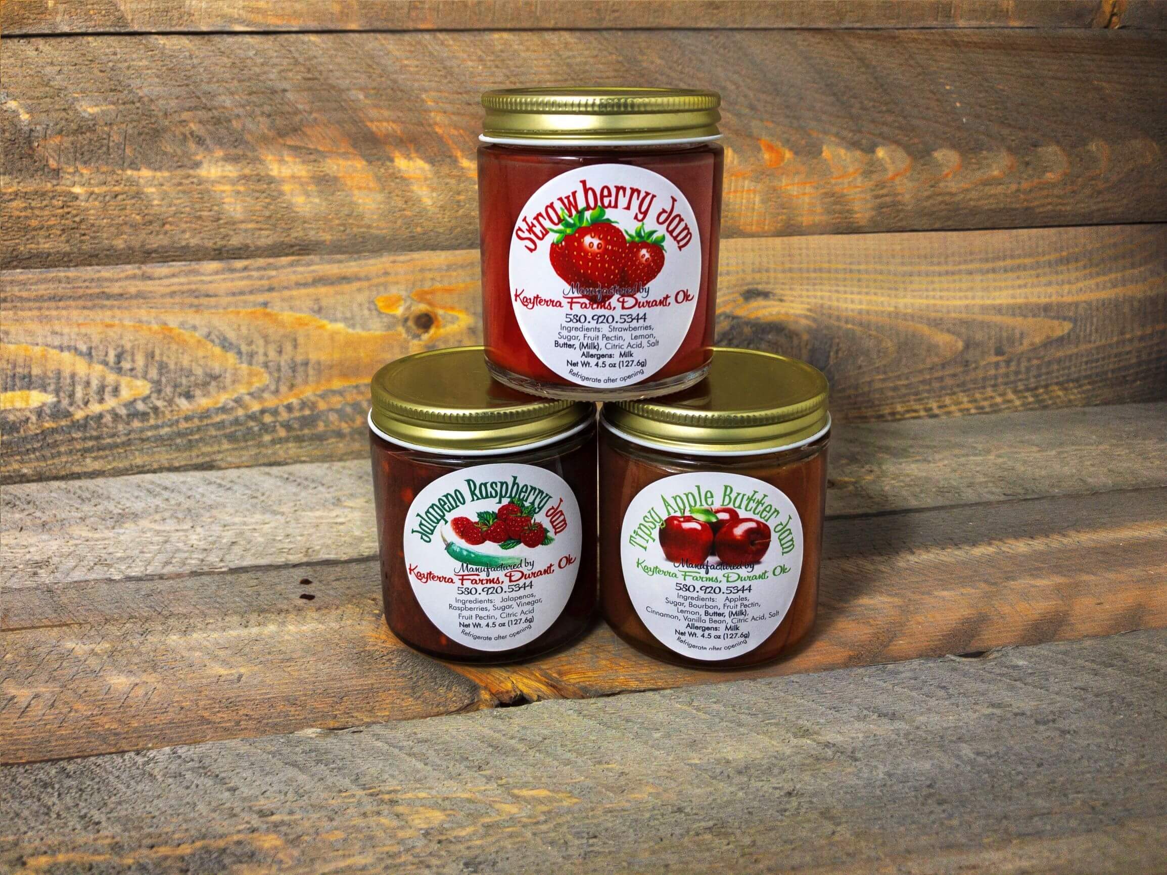 Greatest Hits 3Peat Gift Set featuring Tipsy Apple Butter, Jalapeno Raspberry jam, and Strawberry Jam in 4.5oz jars, beautifully shrink-wrapped.
