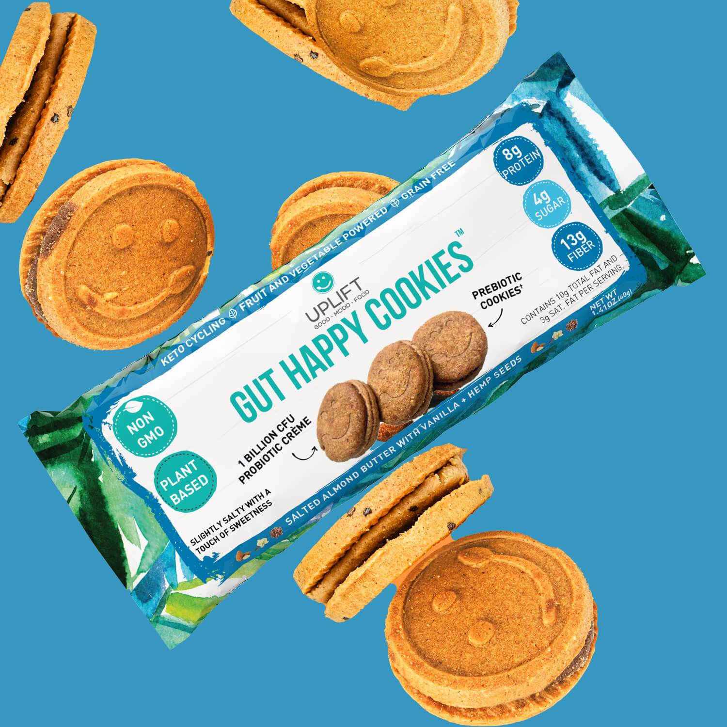 Gut Happy Cookies featuring salted almond butter, vanilla, and hemp, beautifully arranged on a wooden table, showcasing their delicious sandwich cream design.