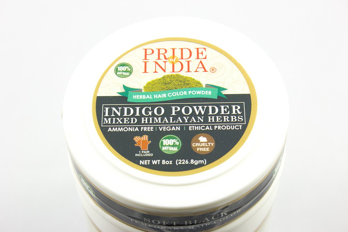 Hair Bloom Natural Jet Black Hair Color jar with indigo powder and Himalayan herbs, showcasing its natural ingredients and eco-friendly packaging.