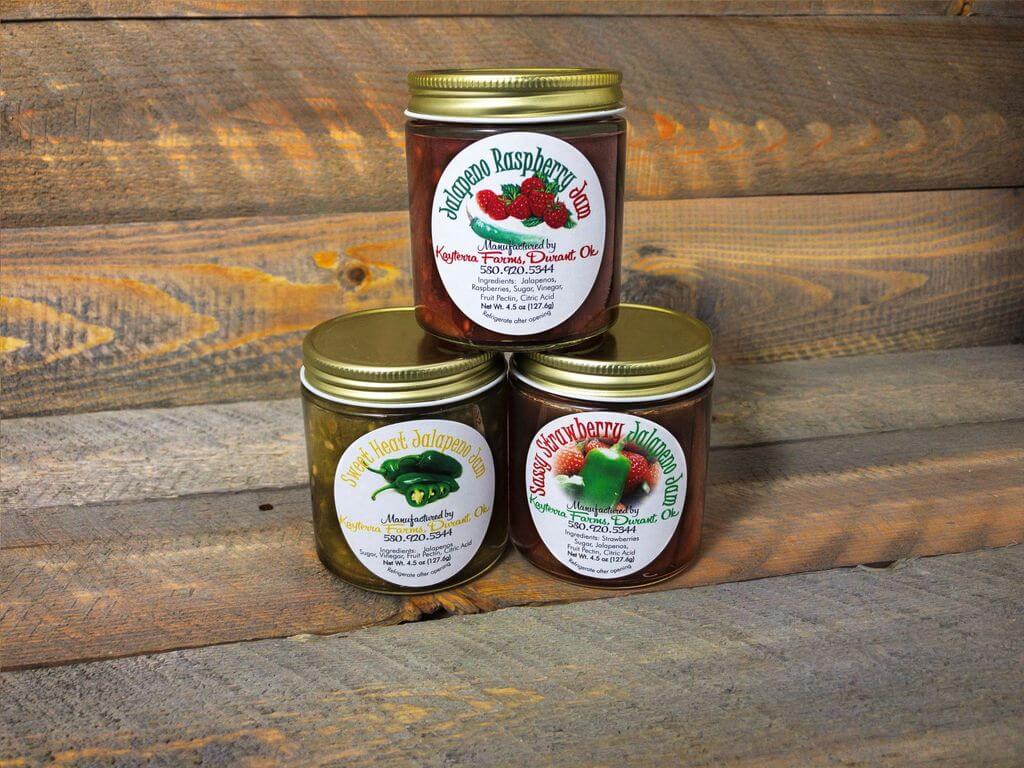 Hot Stuff 3Peat Gift Set featuring three jars of jalapeno flavors: Sassy Strawberry, Jalapeno Raspberry, and Sweet Heat, beautifully packaged.