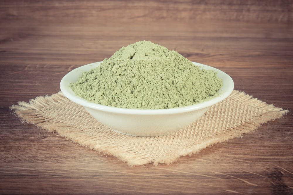 A 1-pound jar of Indian Healing Bentonite Clay Natural Face Mask Powder, showcasing its fine texture and natural color, ideal for skincare.