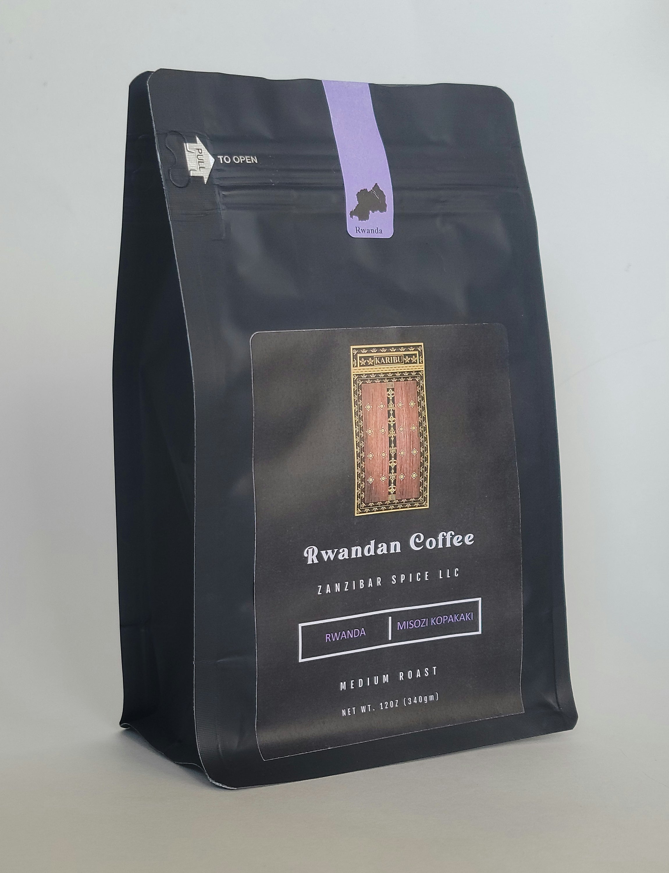 A 12oz resealable bag of Medium Roast Rwanda Plain Coffee showcasing its rich aroma and flavor.