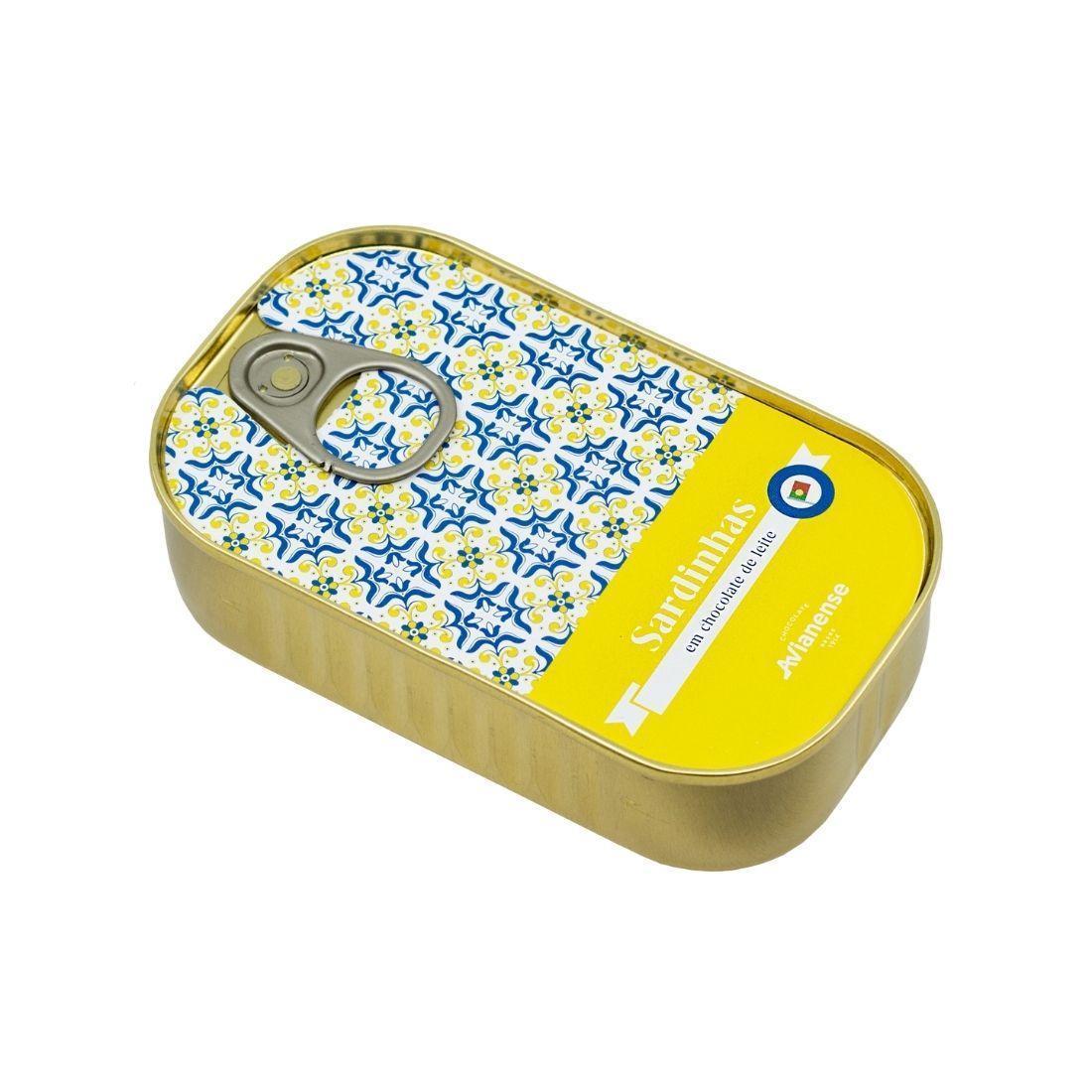 A beautifully crafted box of Milk Chocolate Sardines, featuring intricate designs inspired by Portuguese yellow tiles, showcasing the unique chocolate treats inside.