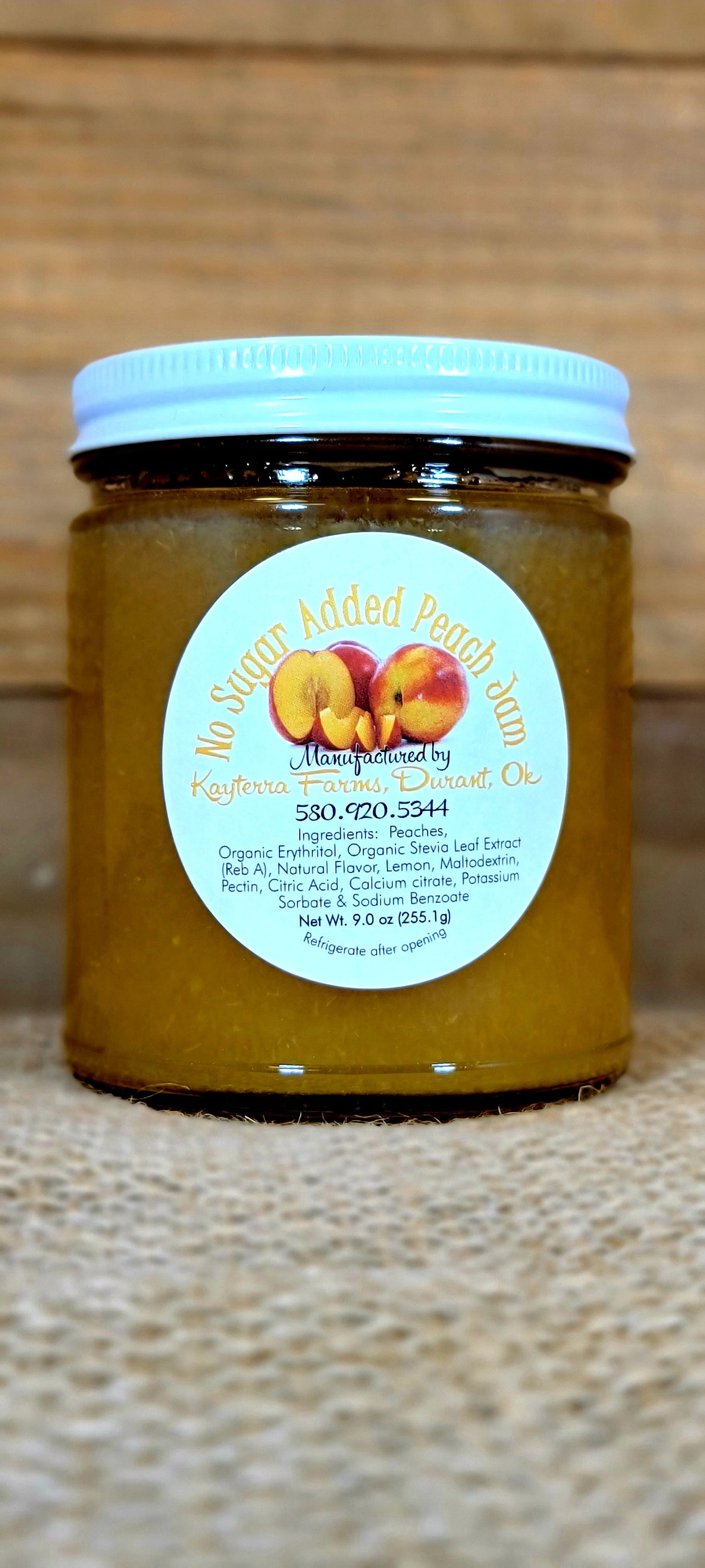 A jar of No Added Sugar Peach, featuring juicy peach slices sweetened with organic stevia, showcasing its vibrant color and natural appeal.