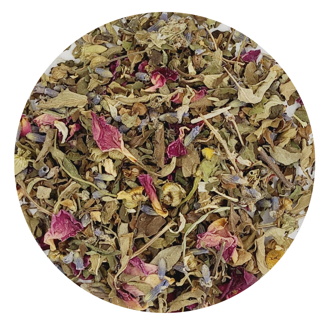 A serene cup of Om Shantea herbal tea blend with loose leaves and fresh herbs, symbolizing peace and tranquility.
