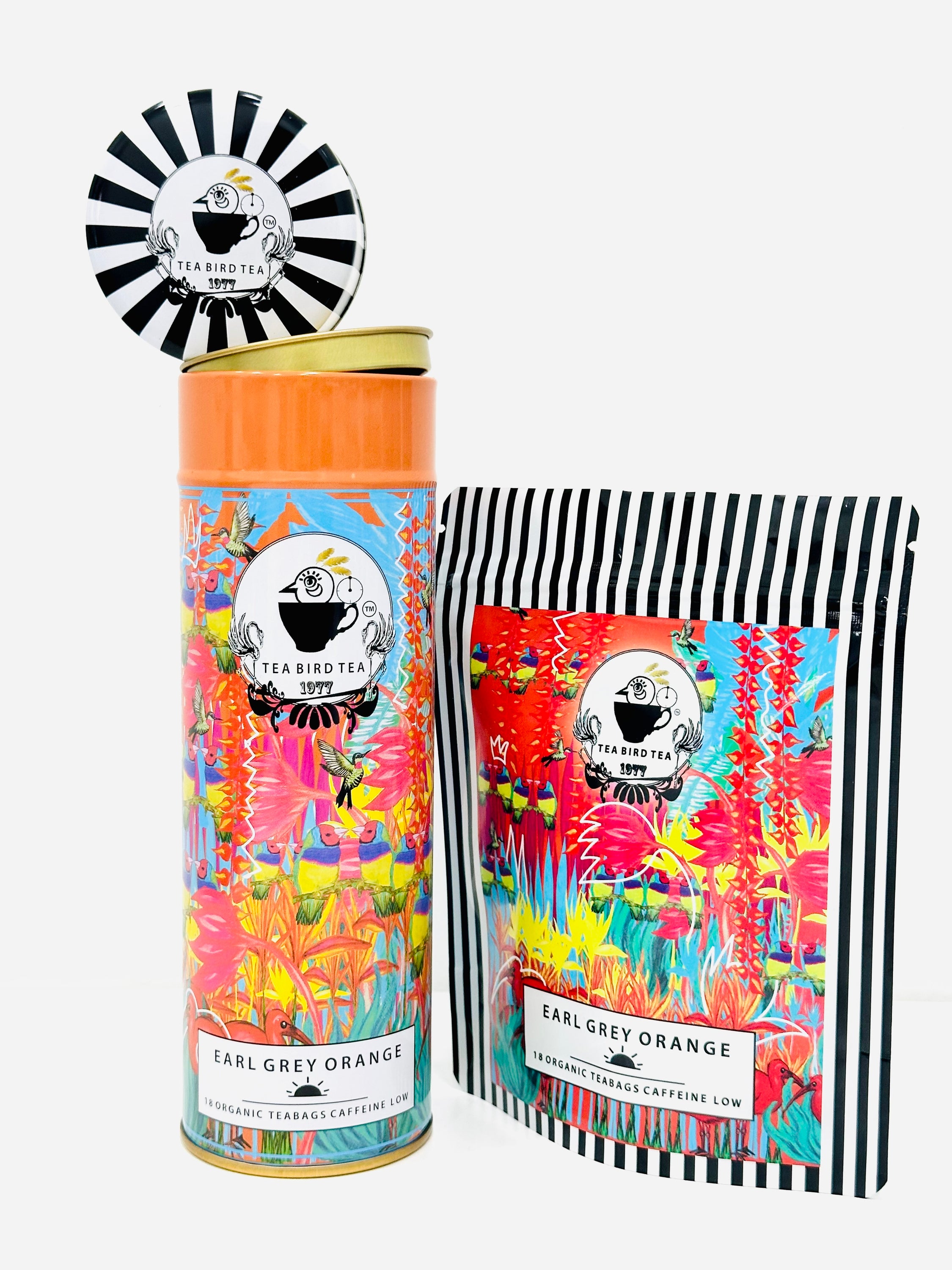 A tin of Organic Earl Grey Orange Tea with 18 teabags, showcasing vibrant packaging and a refreshing blend of black tea and orange flavor.