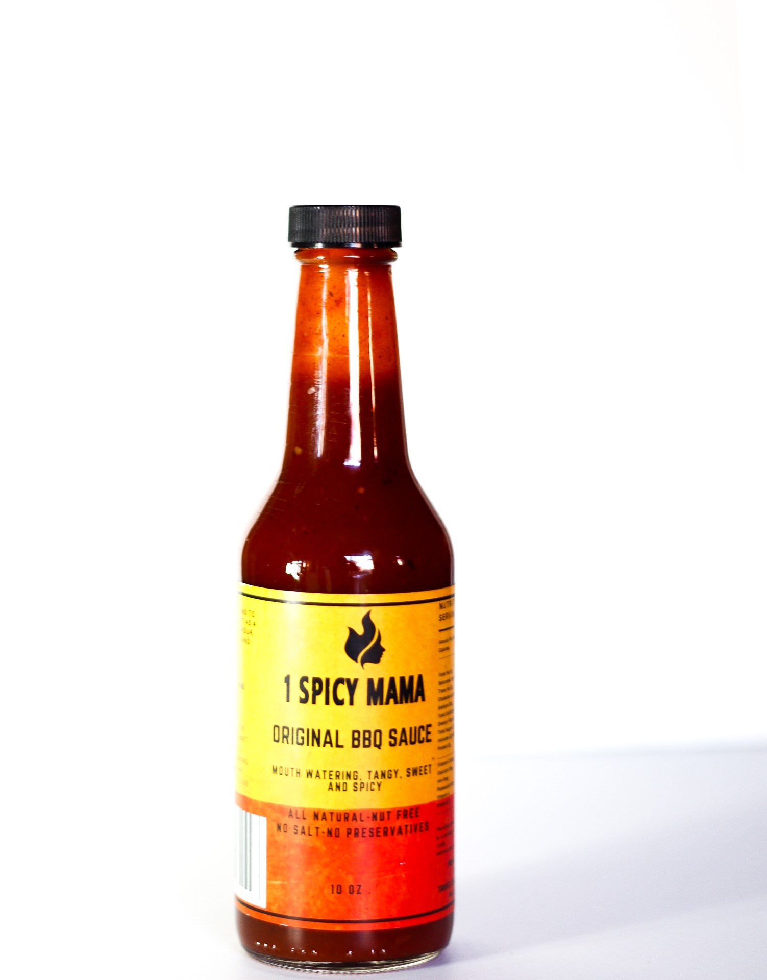 A bottle of ORIGINAL BBQ SAUCE showcasing its spicy, sweet, and tangy flavor, perfect for various dishes.