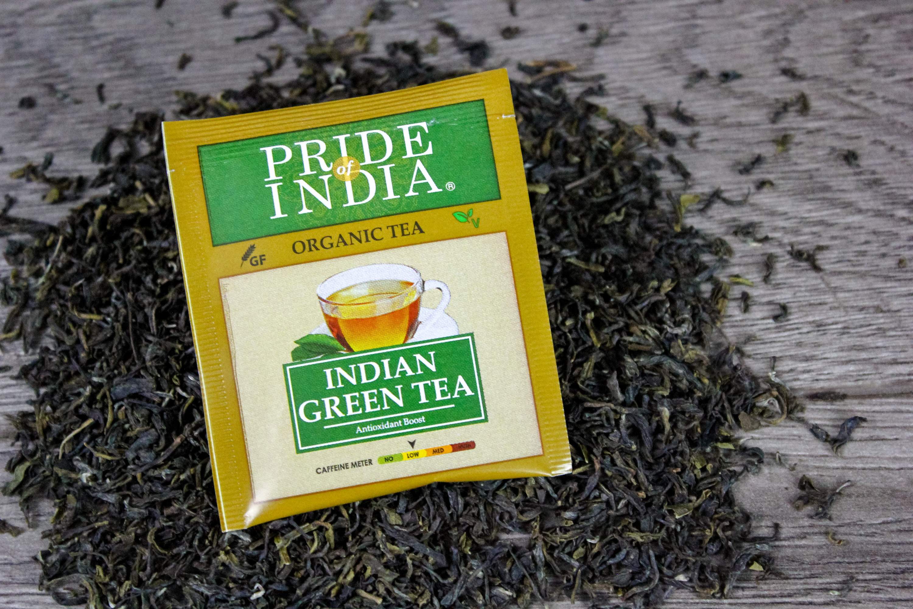 PommBerry Merlot Fruity Green Tea Bags in a box, showcasing organic tea bags with vibrant packaging.