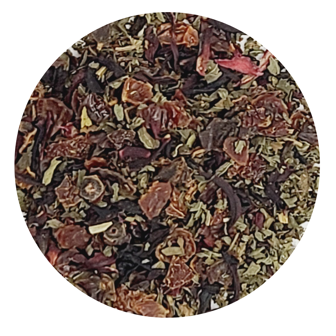 A vibrant package of Ruby Red Sipper herbal tea blend featuring hibiscus, rosehips, and peppermint, set against a serene backdrop.